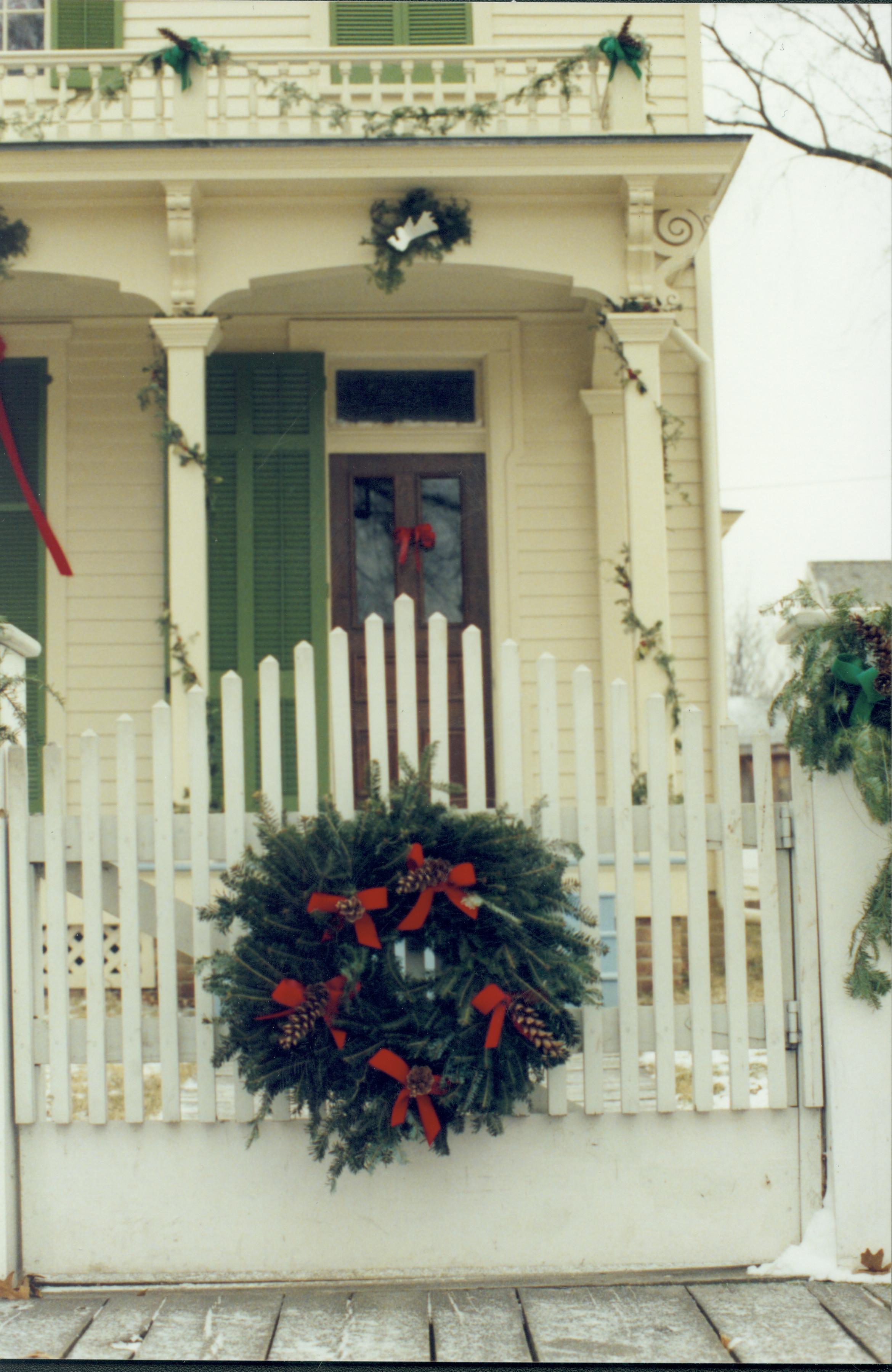 Lincoln Home NHS- Christmas in Lincoln Neighborhood Looking east from 8th Street boardwalk toward Robinson house west gate. Detail. Christmas, neighborhood, decoration, Robinson, gate