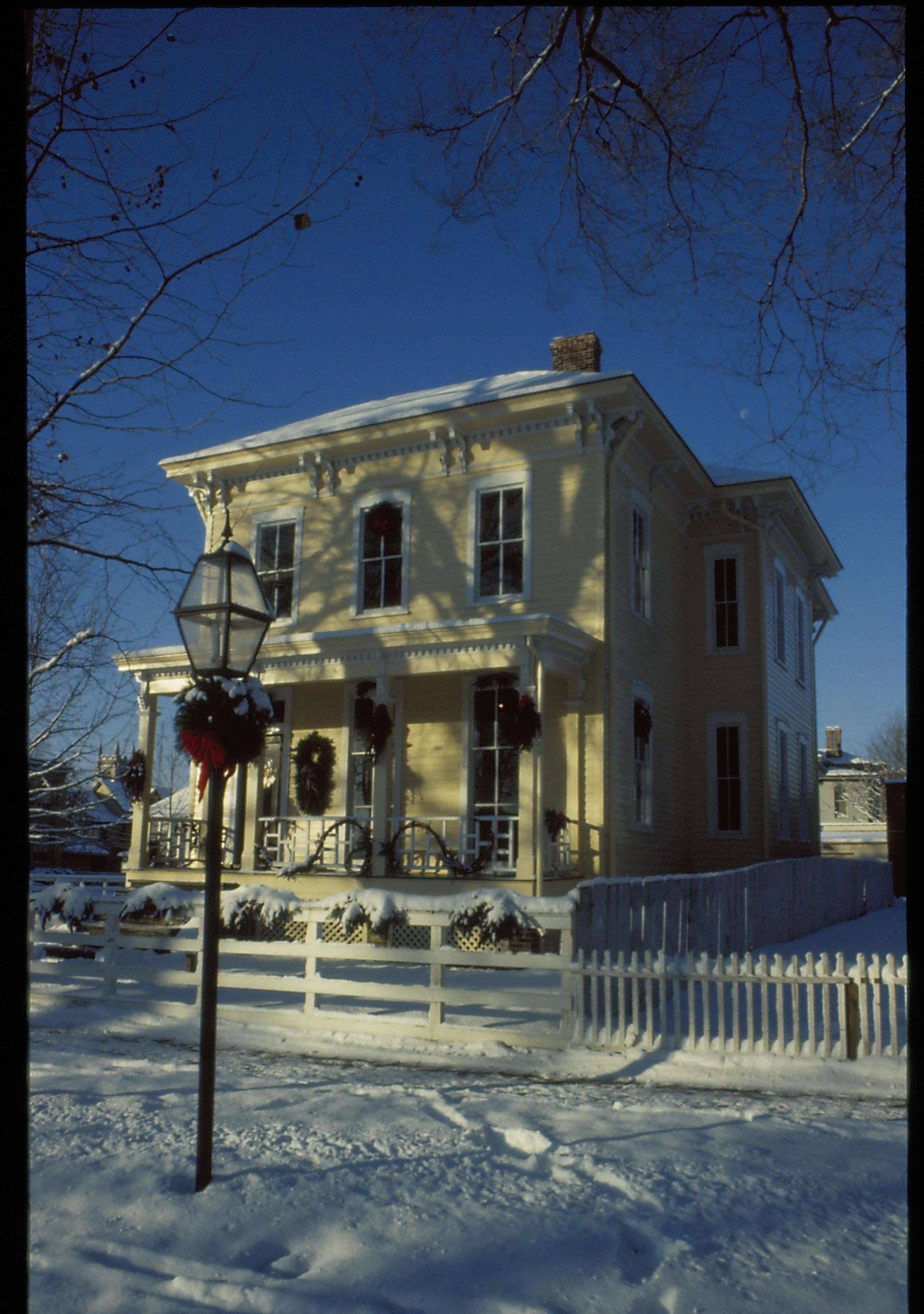 Lincoln Home NHS- Christmas in Lincoln Neighborhood Looking south west from 8th Street, Shutt house decorated for Christmas. Christmas, decorations, Shutt, snow, decor, garland, wreath