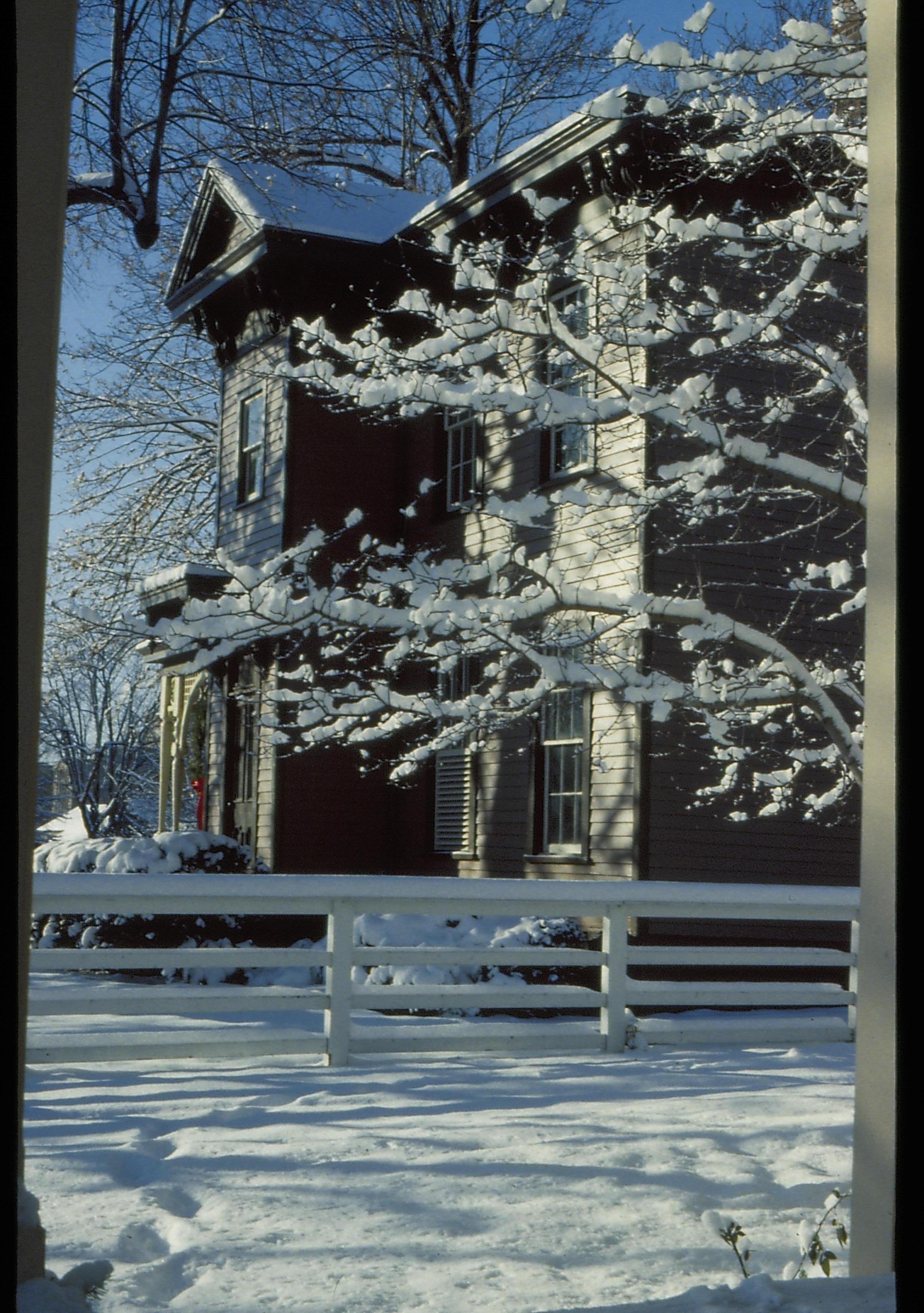 Lincoln Home NHS- Christmas in Lincoln Neighborhood Looking north from Rosenwald porch, Dean house decorated for Christmas. Christmas, decorations, Dean, Rosenwald, snow, wreath