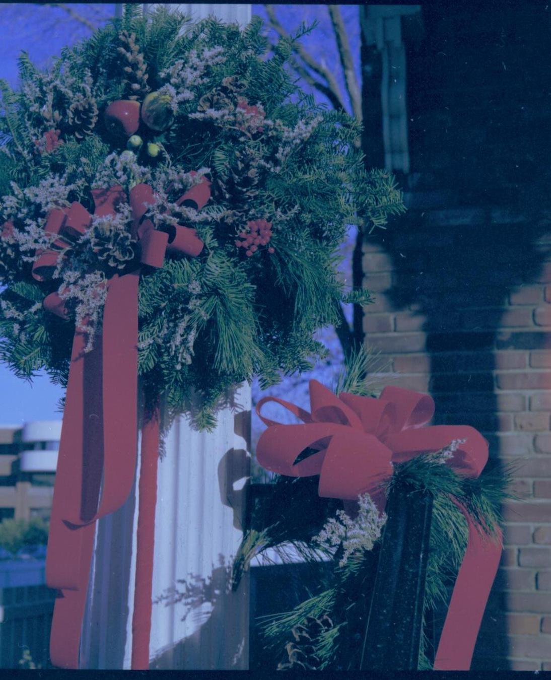 Lincoln Home NHS- Christmas in Lincoln Neighborhood Looking north east, Christmas decor on Conference Center porch. Detail. Christmas, decorations, Conference, center, decor, porch, wreath, garland