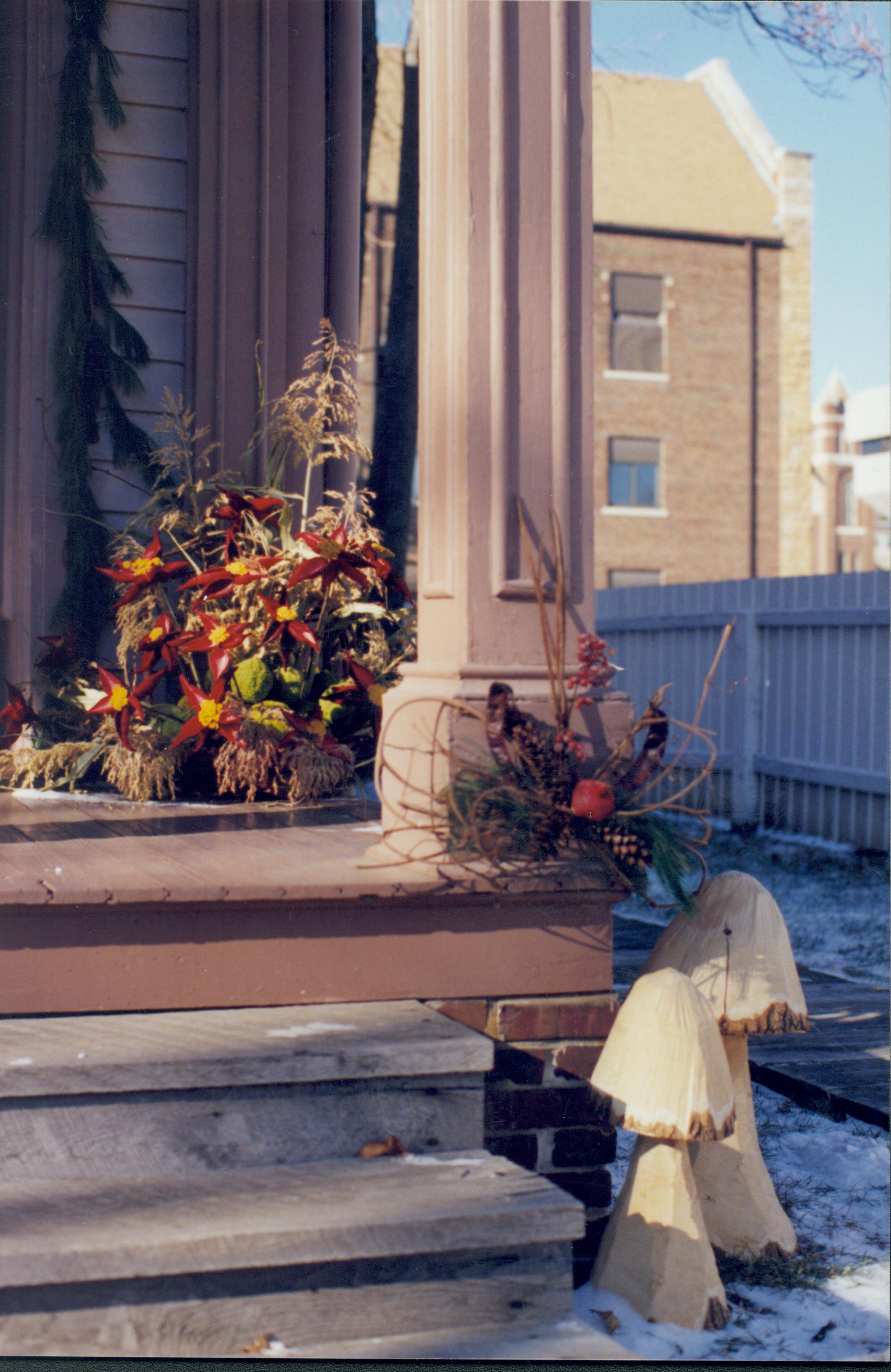 Lincoln Home NHS- Christmas in Lincoln Neighborhood Looking northwest toward decorations on Beedle house porch. Detail. Christmas, neighborhood, Beedle, decoration, porch