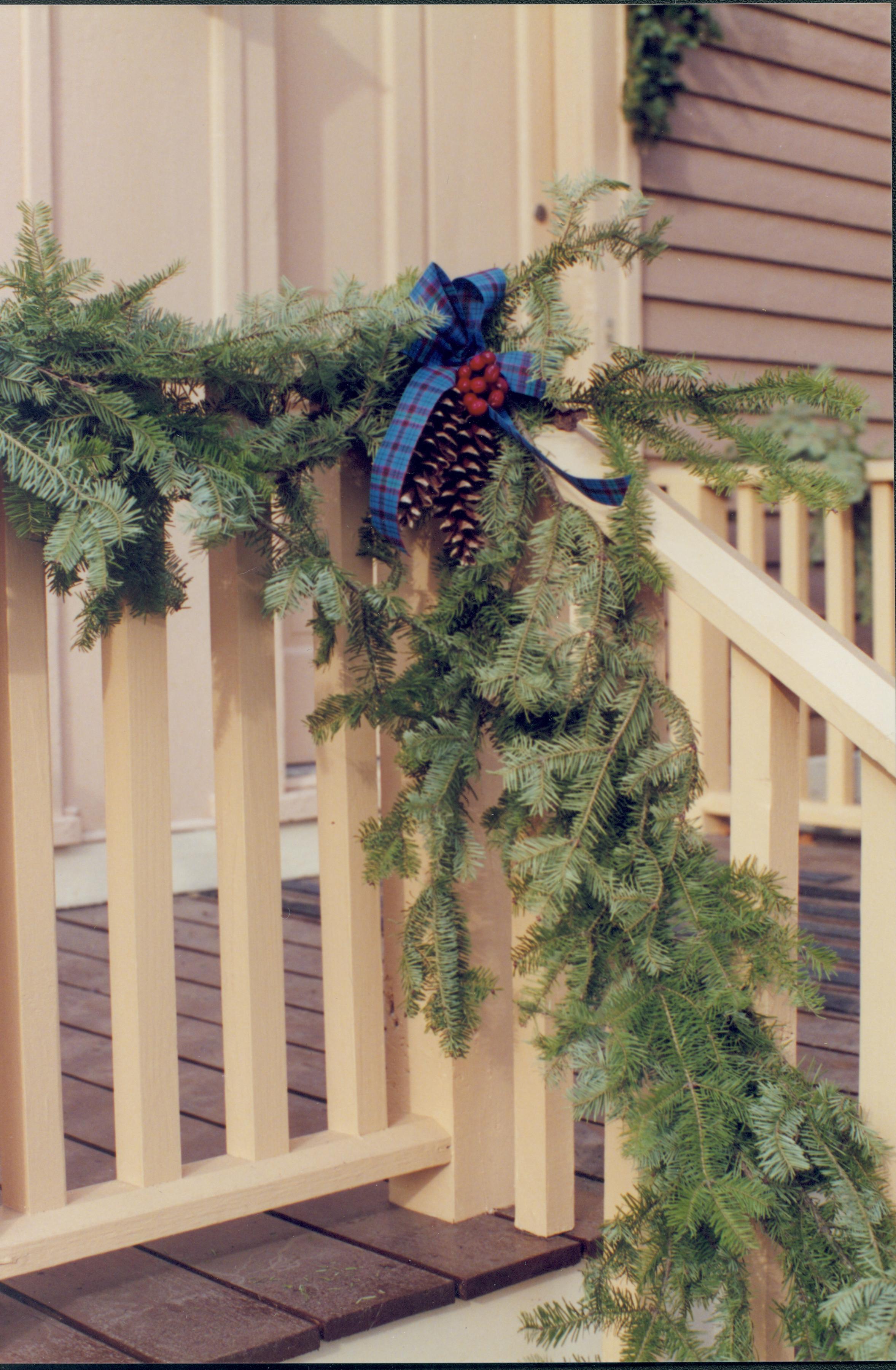 Lincoln Home NHS- Christmas in Lincoln Neighborhood Looking toward decorations on porch of neighborhood home. Sprigg? Christmas, neighborhood, decoration, porch