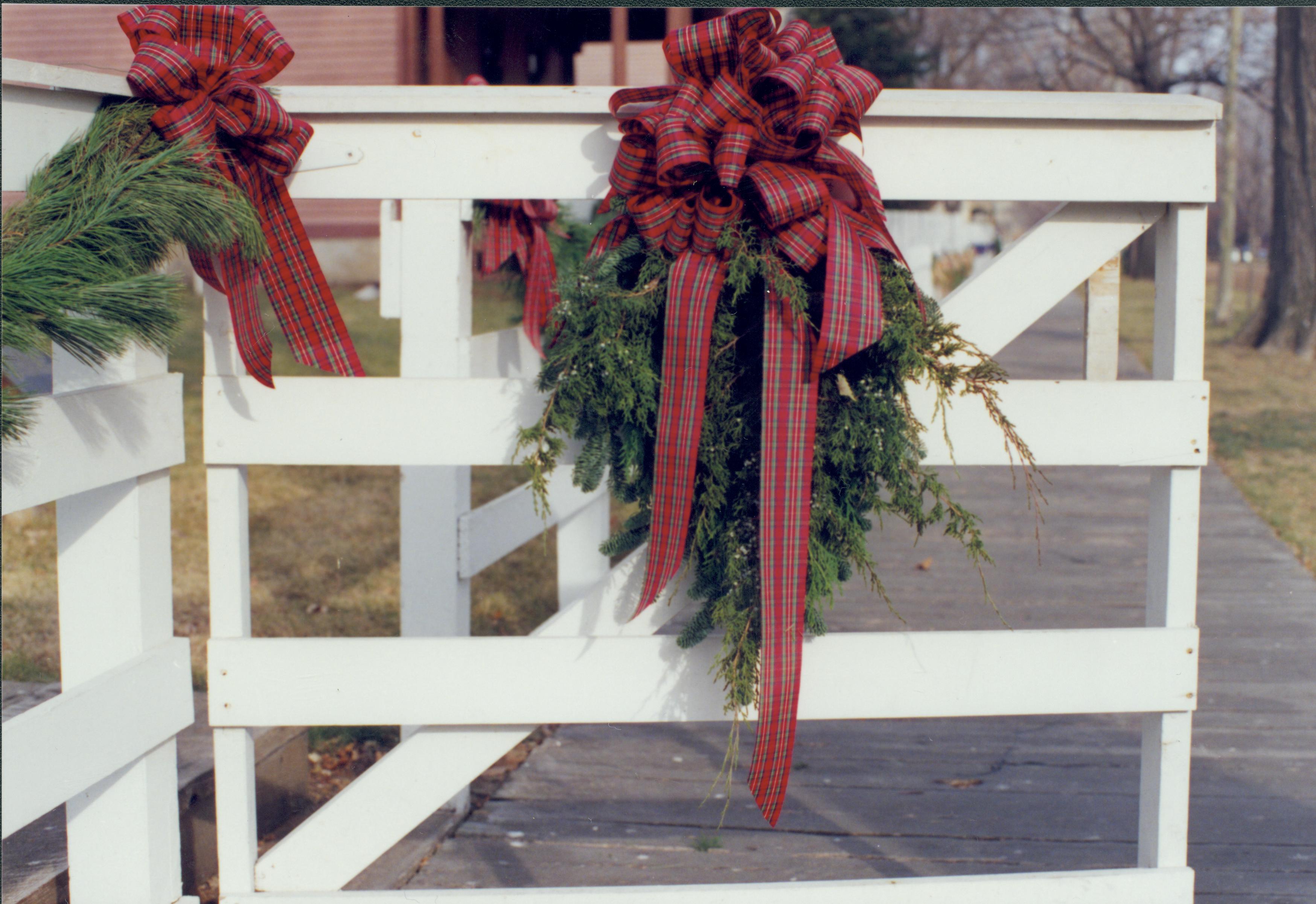 Lincoln Home NHS- Christmas in Lincoln Neighborhood Looking northwest toward Lyon house open gate. Detail. Christmas, neighborhood, detail, gate, wreath, decor