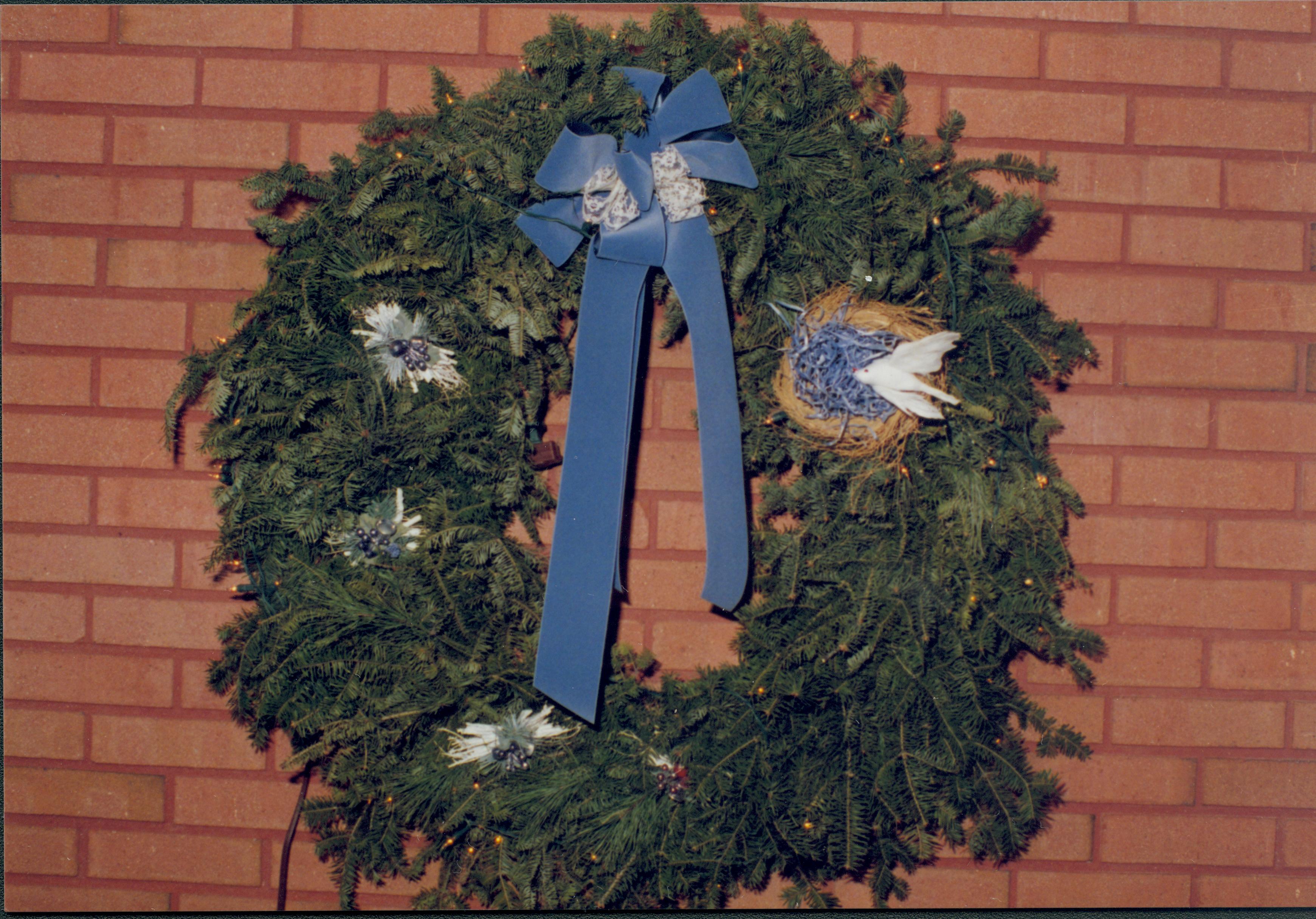 Lincoln Home NHS- Christmas in Lincoln Neighborhood Looking at wreath on unidentified wall of Visitor Center. Detail. Christmas, neighborhood, visitor center, decoration, detail