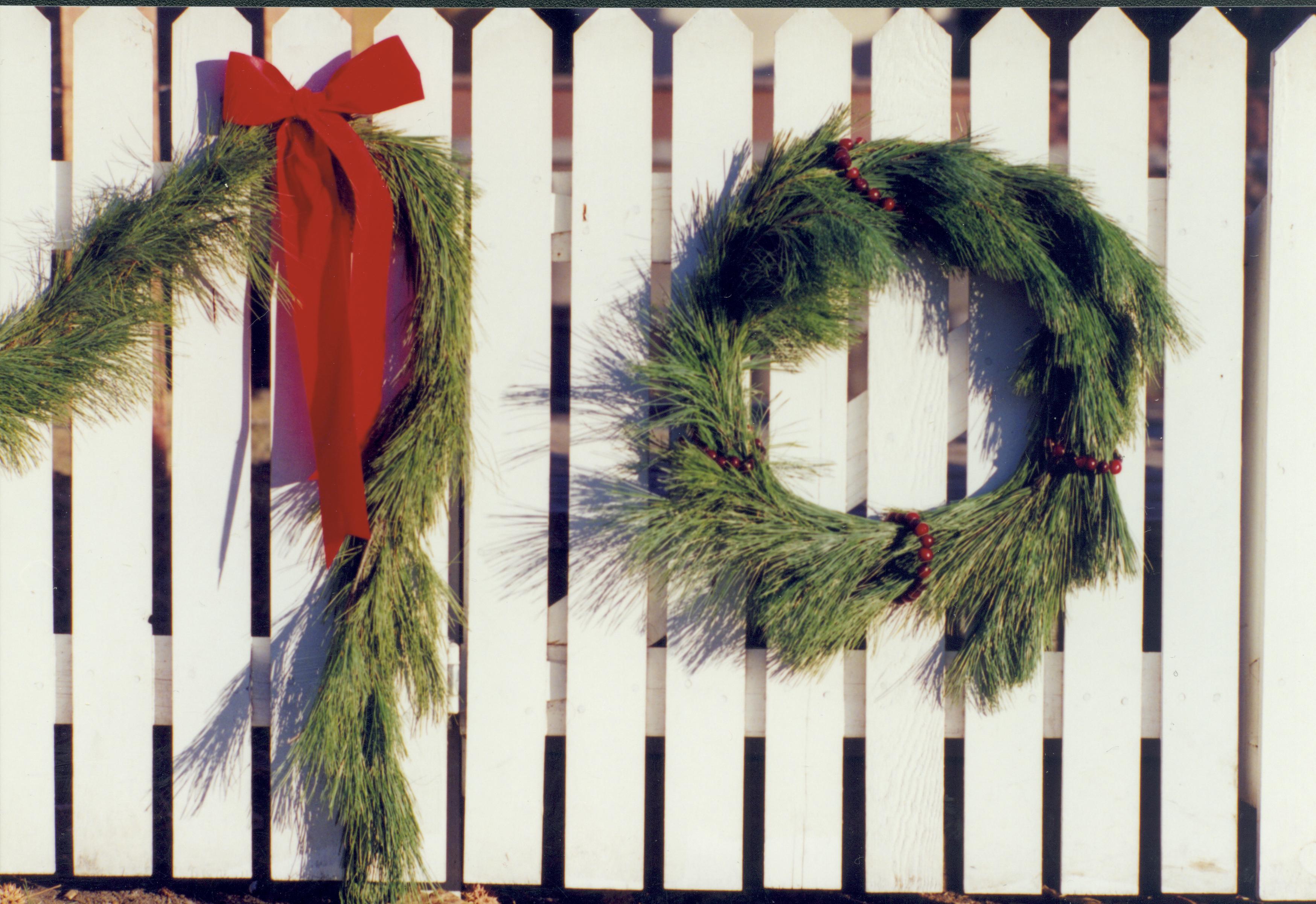 Lincoln Home NHS- Christmas in Lincoln Neighborhood Christmas wreaths on fence. Detail. Christmas, neighborhood, wreath, fence, detail