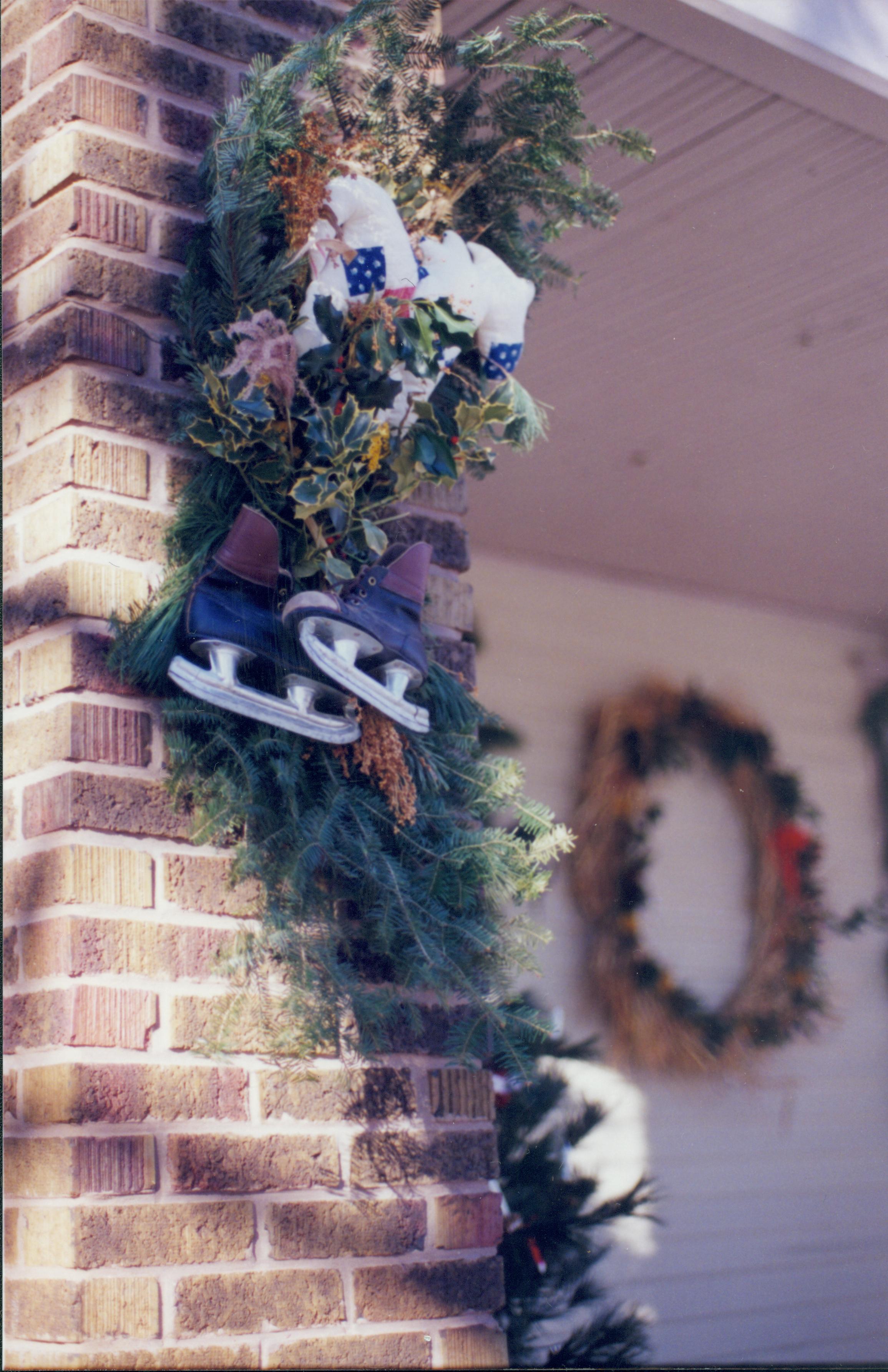 Lincoln Home NHS- Christmas in Lincoln Neighborhood Looking north west, garland on pillar of Sprigg house porch. Detail. Christmas, neighborhood, Sprigg, porch, column, garland, detail