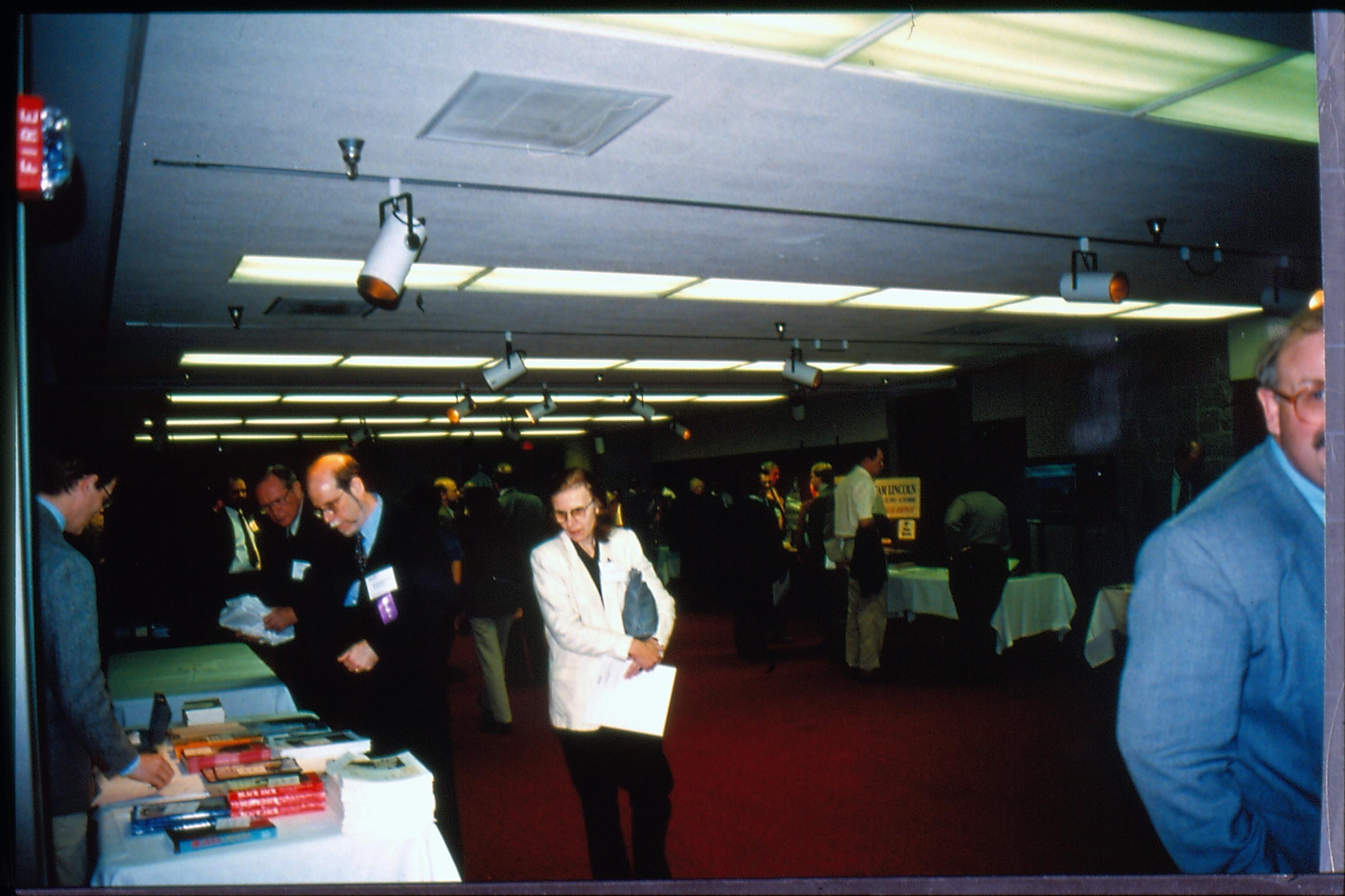 Atendees at book table & other exhibits. 1997 Colloq (color slides) Colloquium, 1997