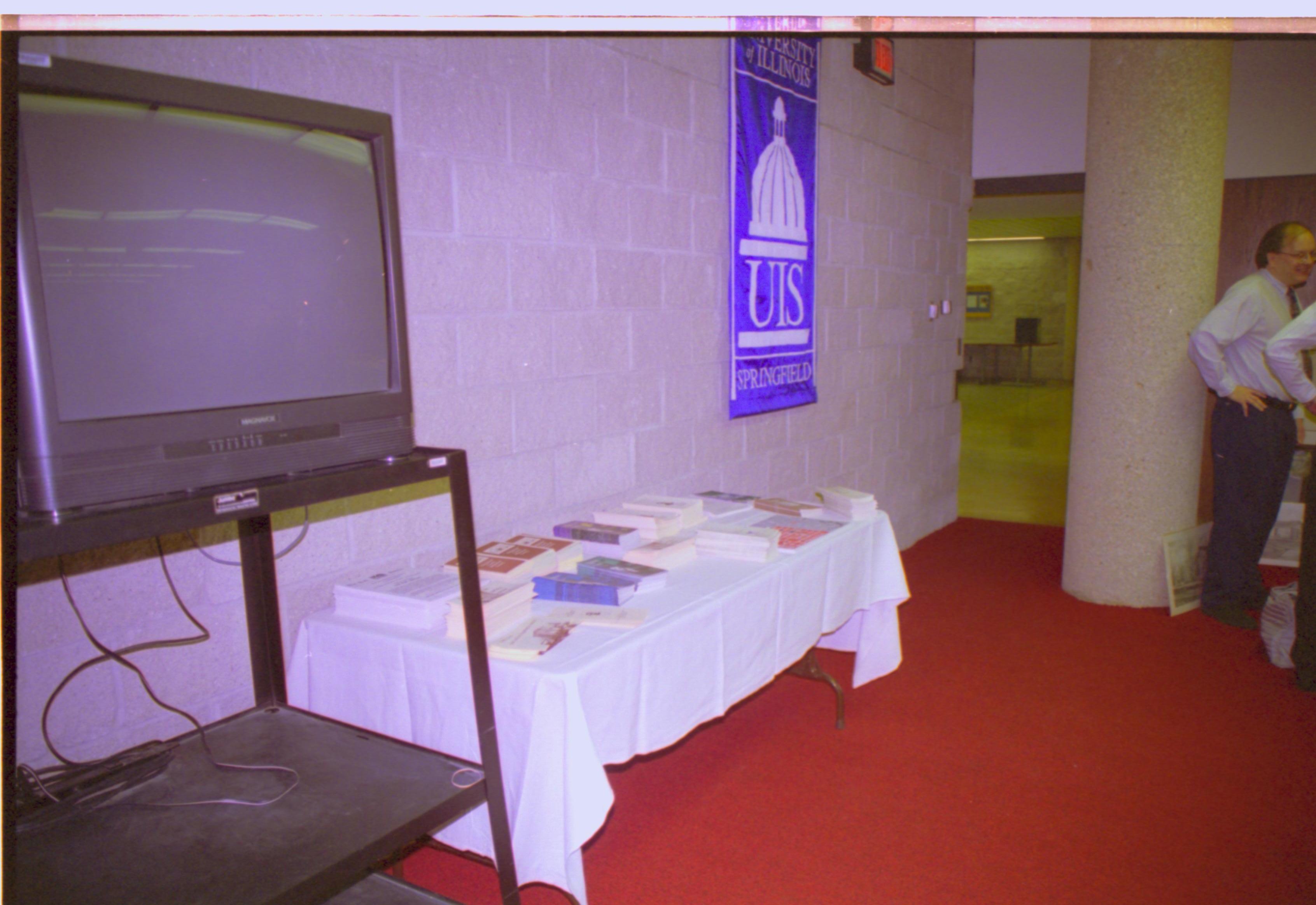 Literature table (TV monitor). 4-1997 Colloq (color); 14 Colloquium, 1997