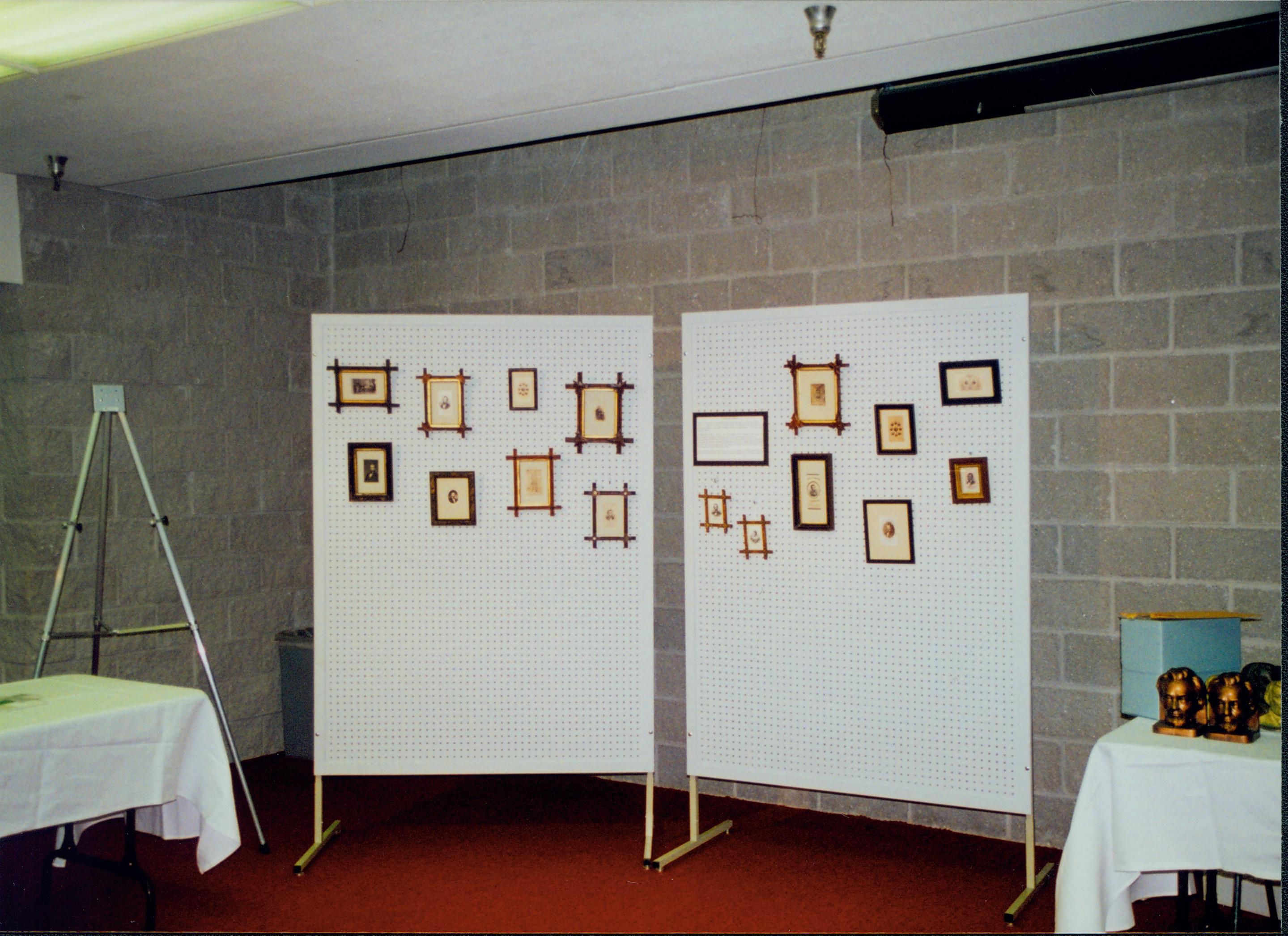 Jack Smith exhibit (pictures hung on peg board). 5-1997 Colloq (color); 22 Colloquium, 1997