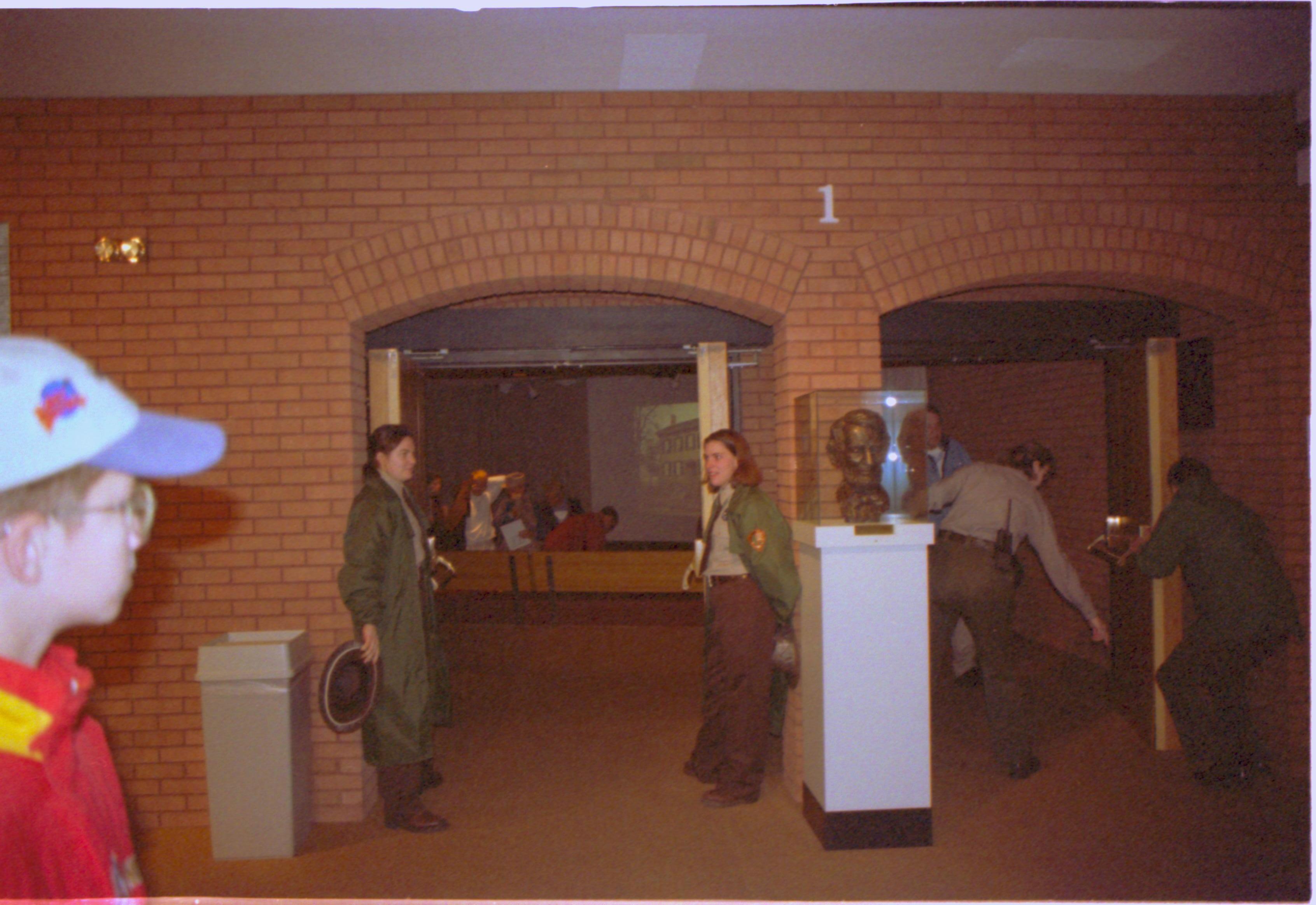 Four Rangers standing at doors to Theater I. 2-1997 Colloq (color); 19 Colloquium, 1997