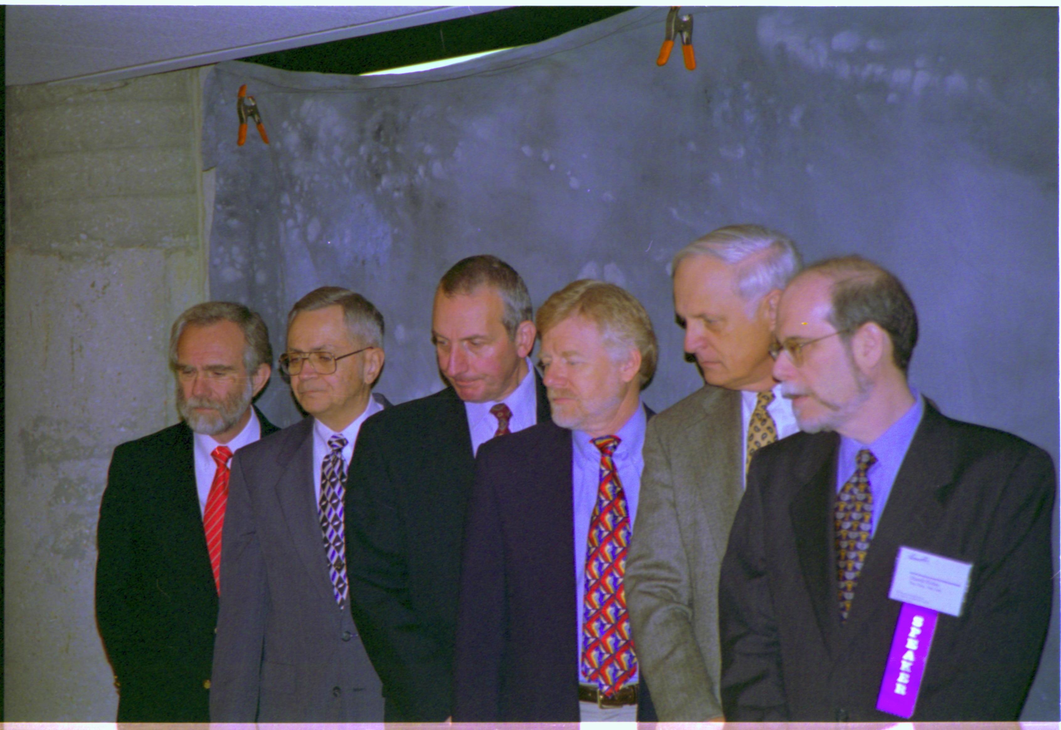 Speakers getting pictures taken 3-1997 Colloq (color); 17 Colloquium, 1997