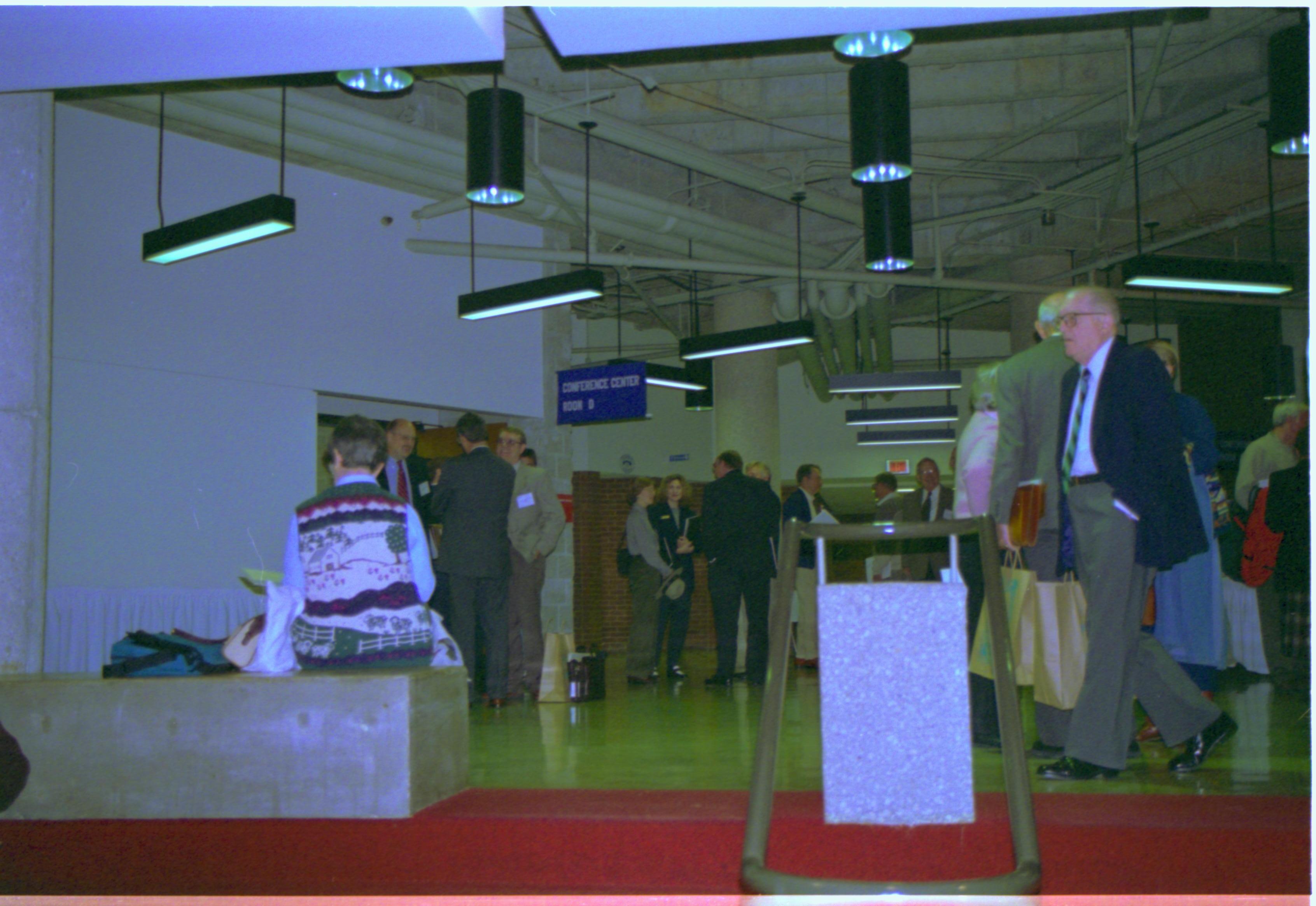 Attendees in exhibit hall. 3-1997 Colloq (color); 25 Colloquium, 1997