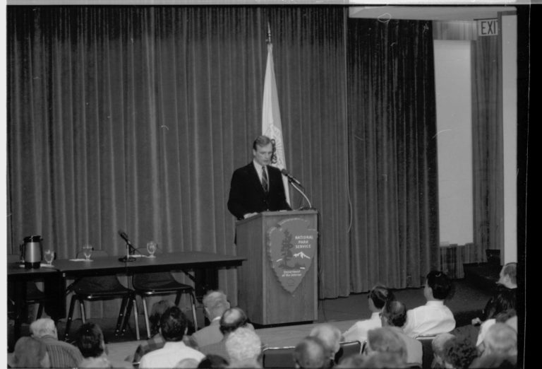 Man on stage at NPS podium. Colloquium, 1991 Lincoln, Colloquium