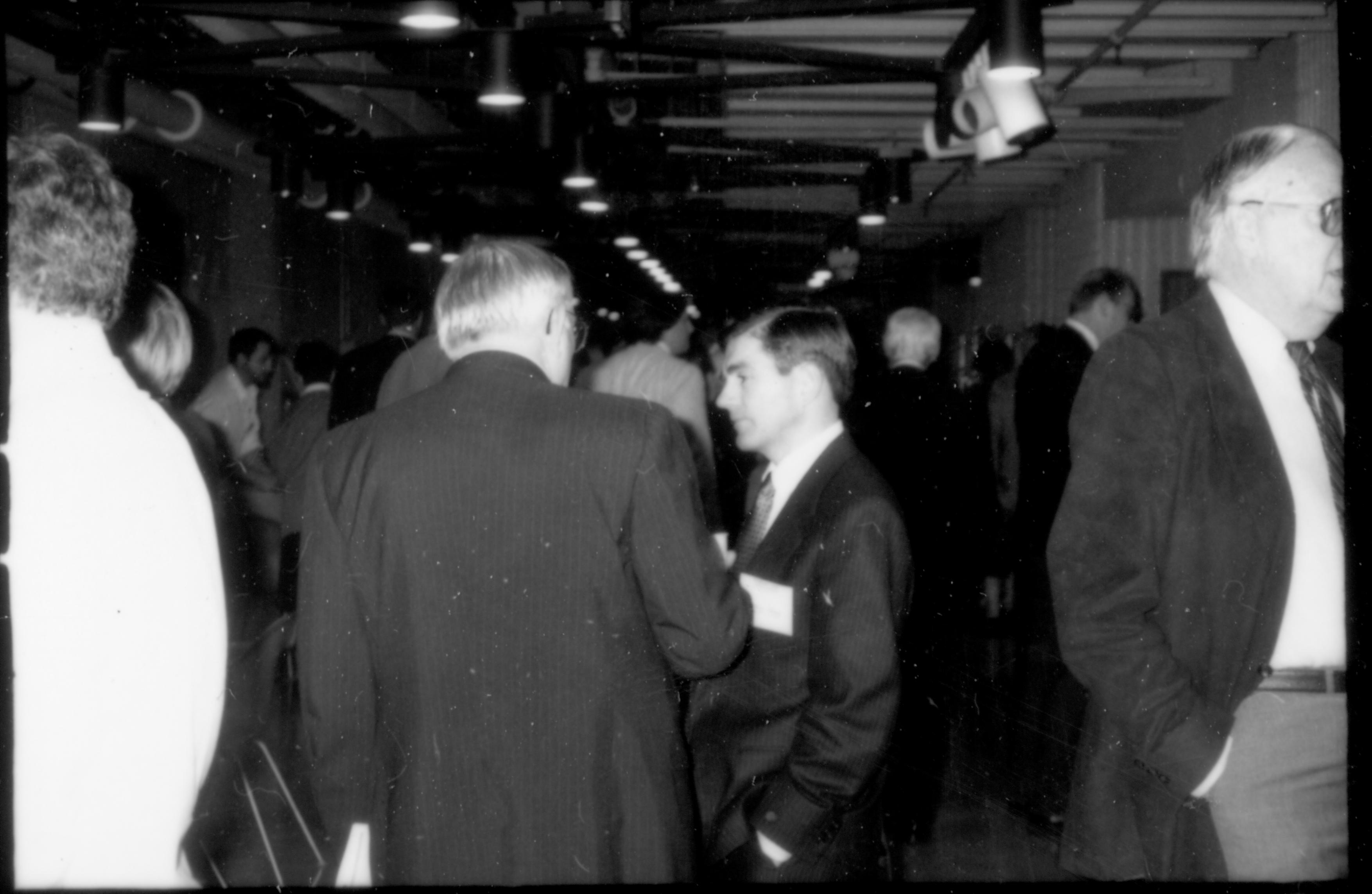 Two men standing, conversing. 1992 Lincoln Colloquium Lincoln, Colloquium