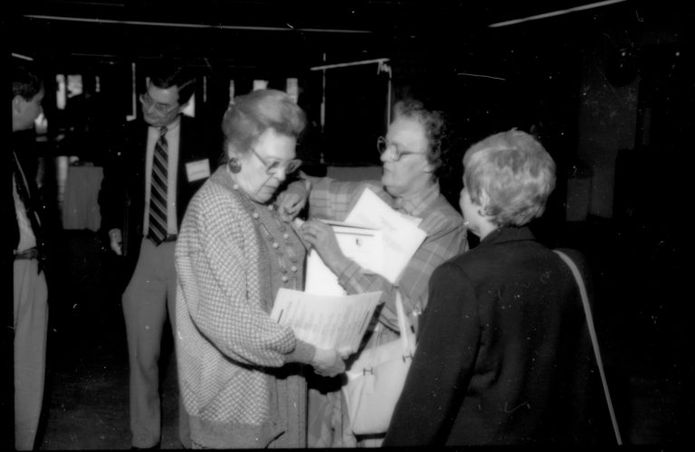 Three ladies standing, conversing 1992 Lincoln Colloquium; Outside #72 Lincoln, Colloquium