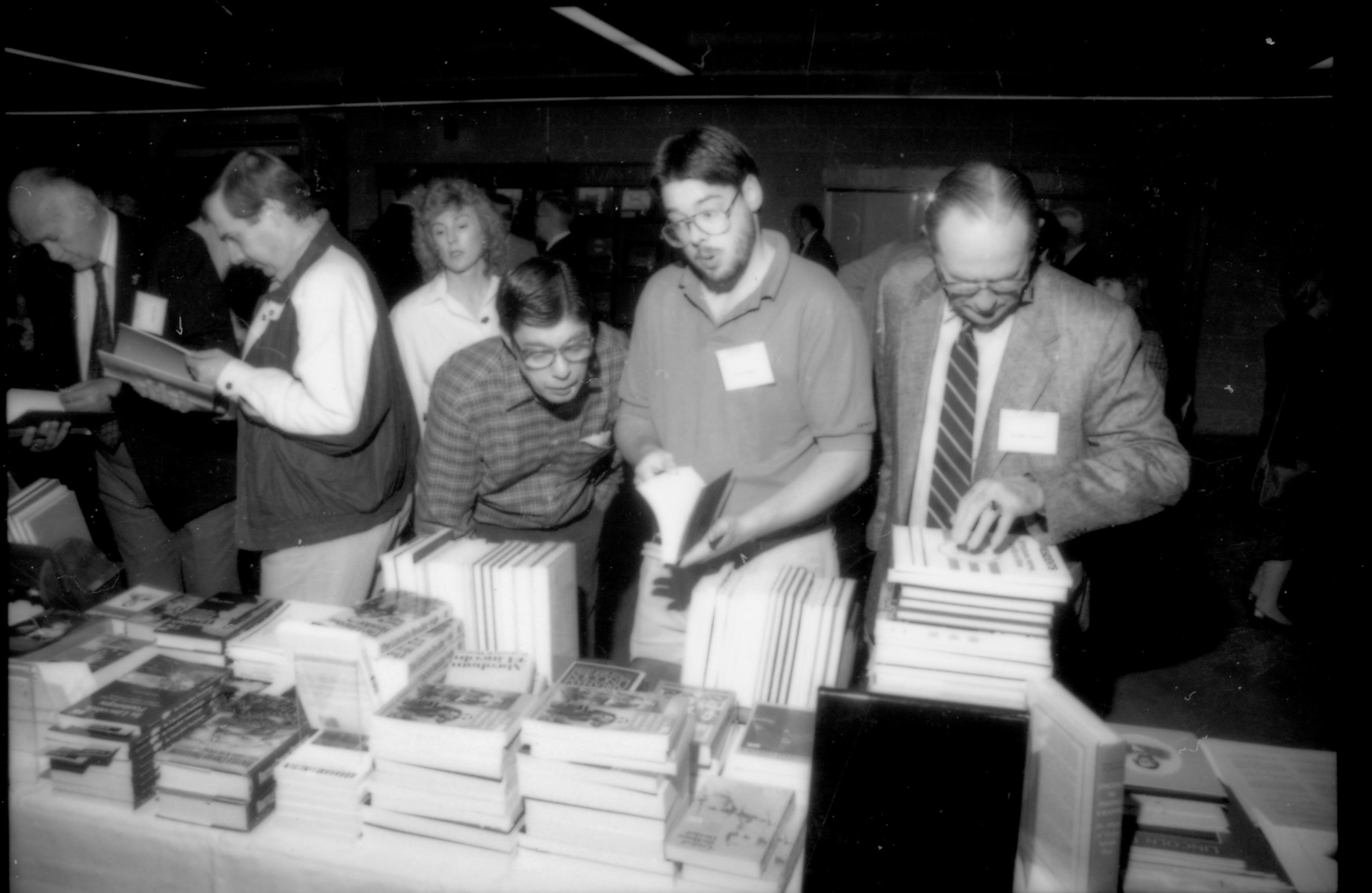 People at book tables 1992 Lincoln Colloquium; Outside #72 Lincoln, Colloquium