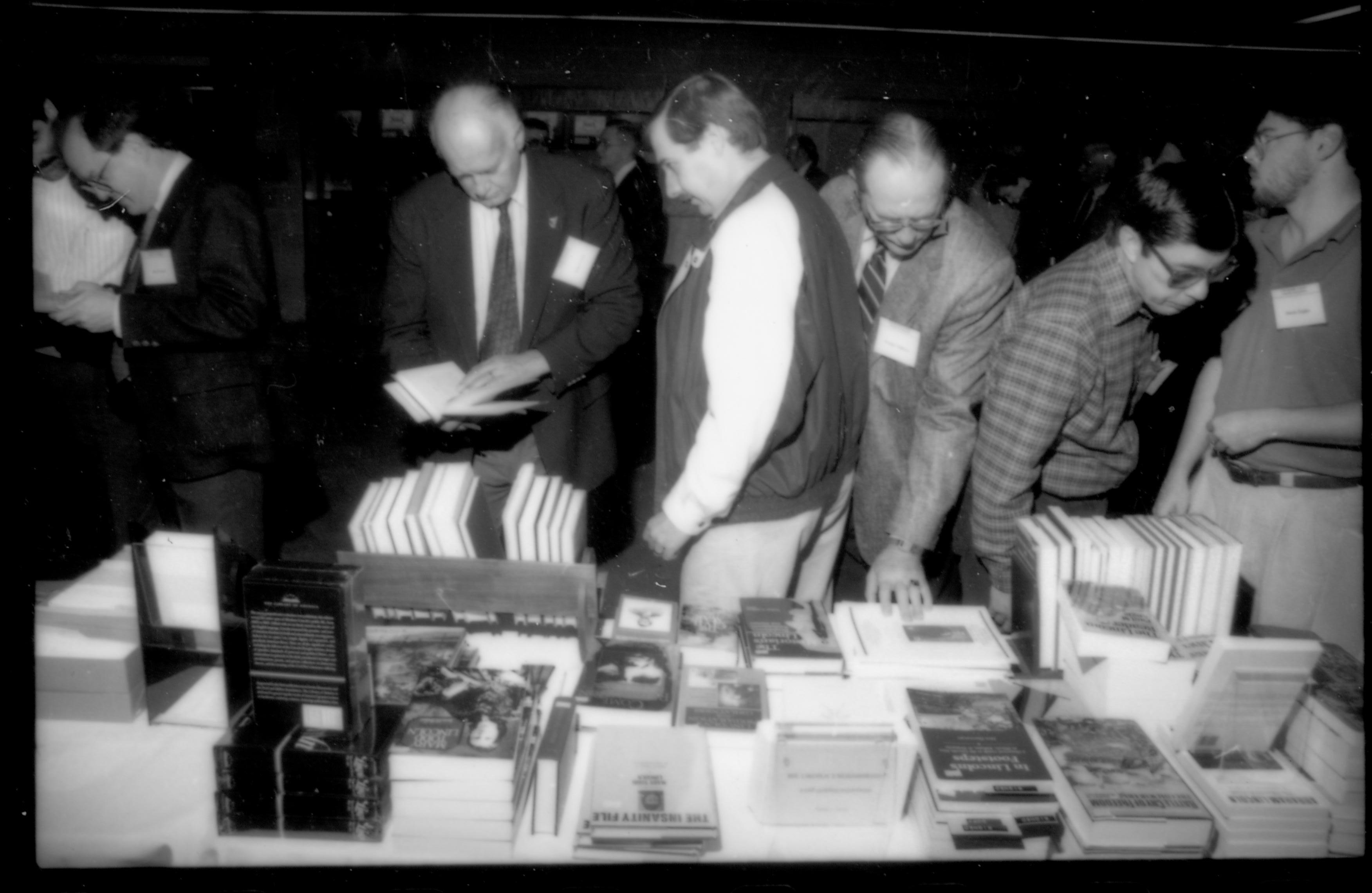 People at book tables 1992 Lincoln Colloquium; Outside #72 Lincoln, Colloquium