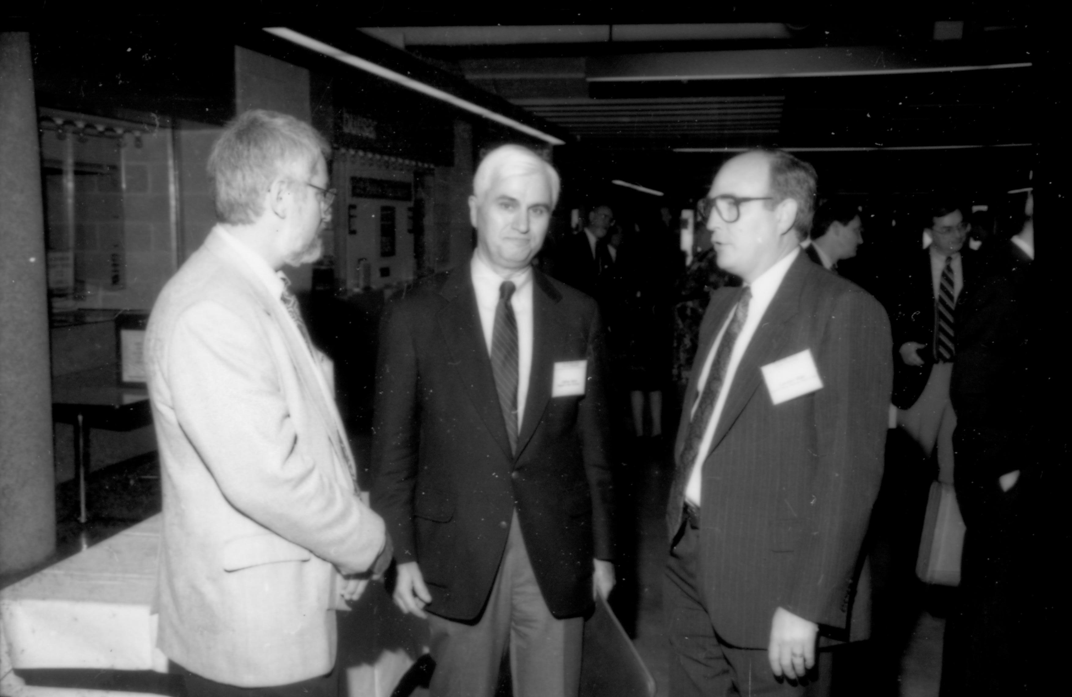 Three men talking. 1992 Lincoln Colloquium; Outside #72 Lincoln, Colloquium