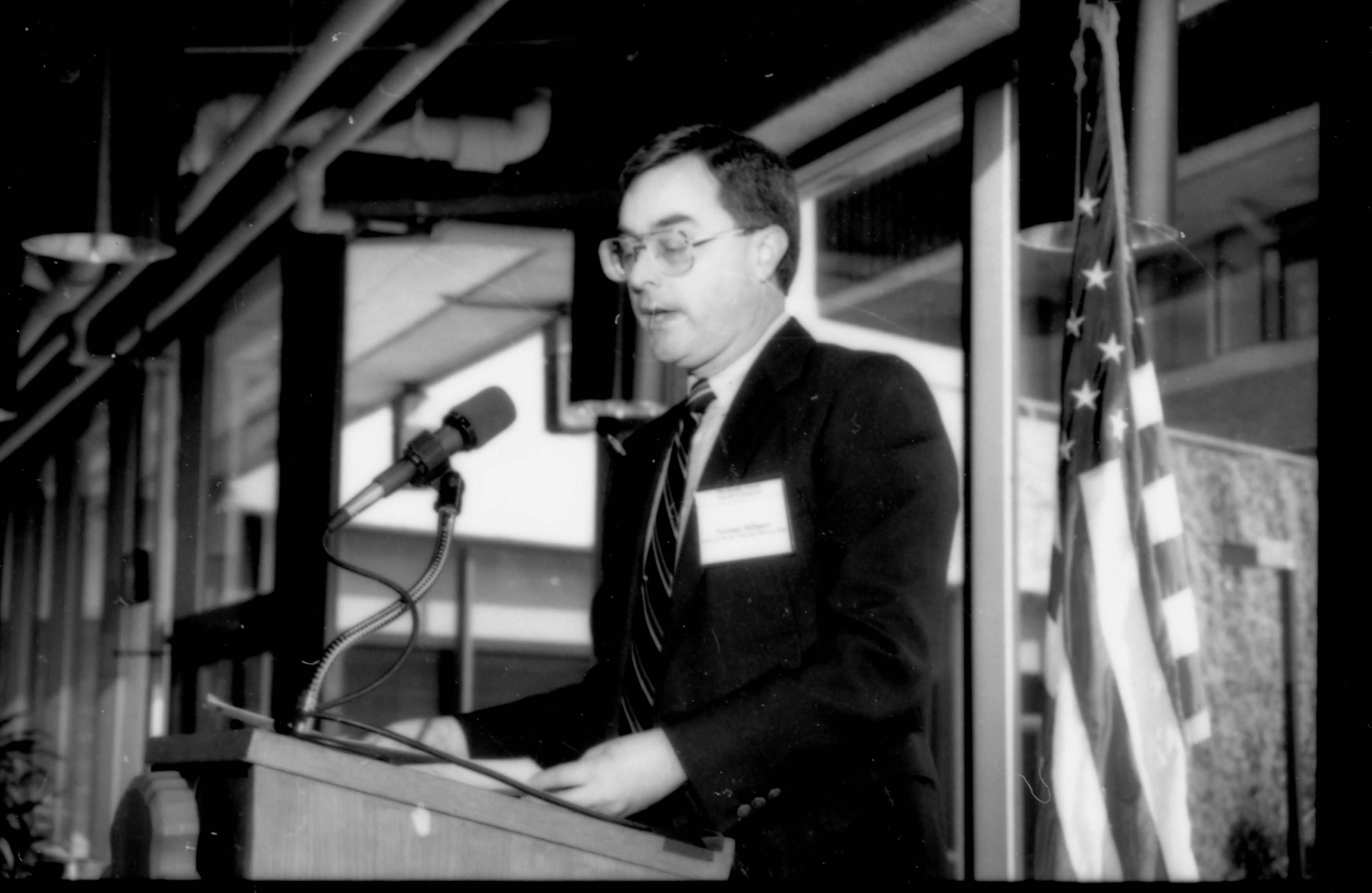 Close up of man at podium. 1992 Lincoln Colloquium; Outside #71 Lincoln, Colloquium