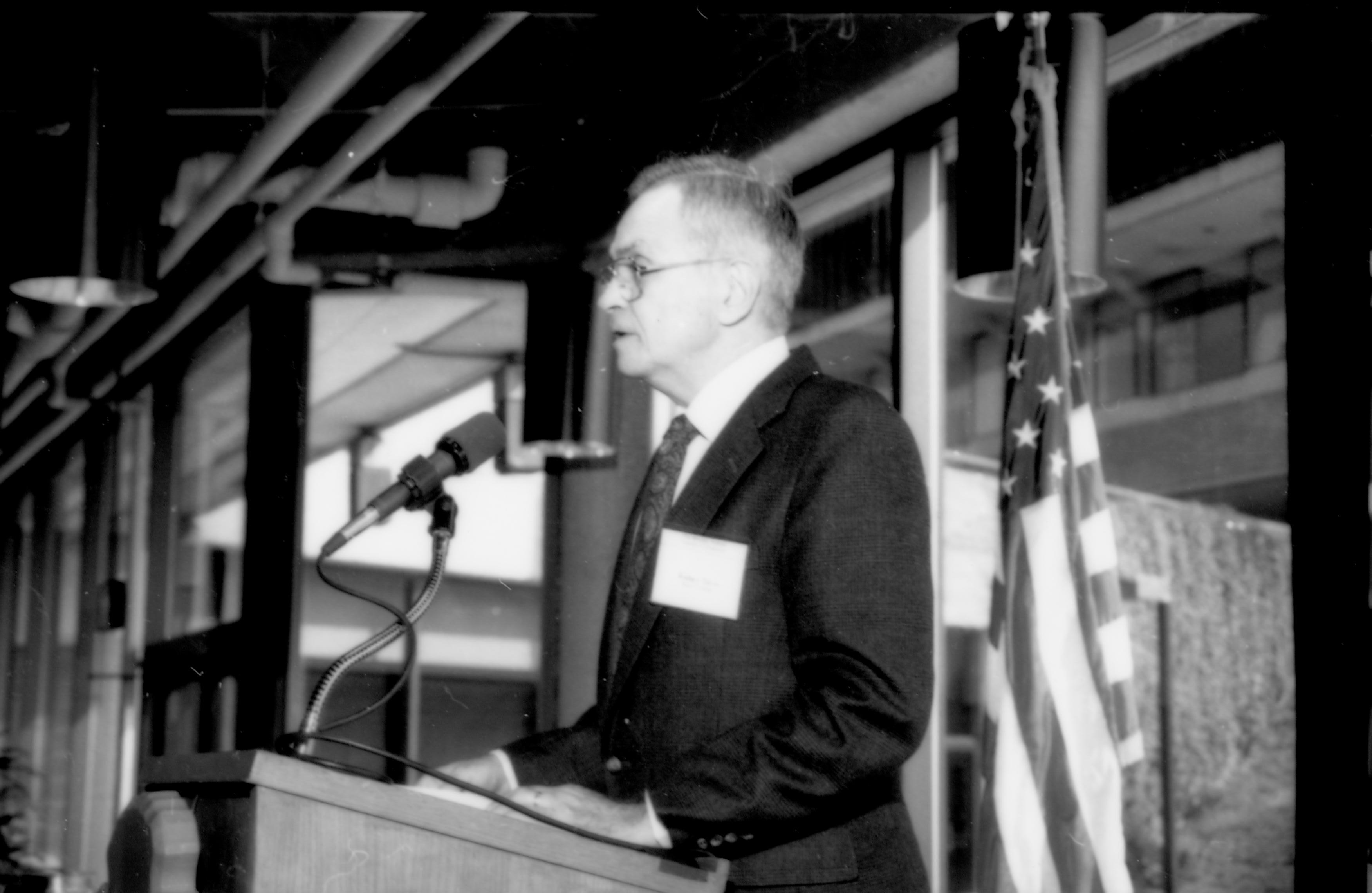Close up of man at podium. 1992 Lincoln Colloquium; Outside #71 Lincoln, Colloquium