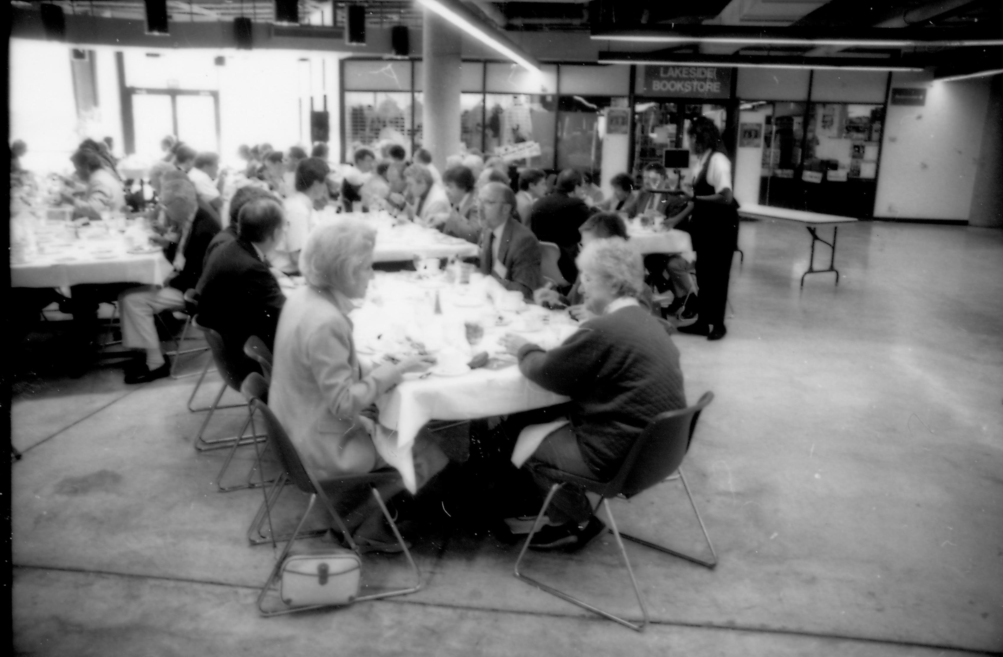 People seated at tables eating. 1992 Lincoln Colloquium Lincoln, Colloquium