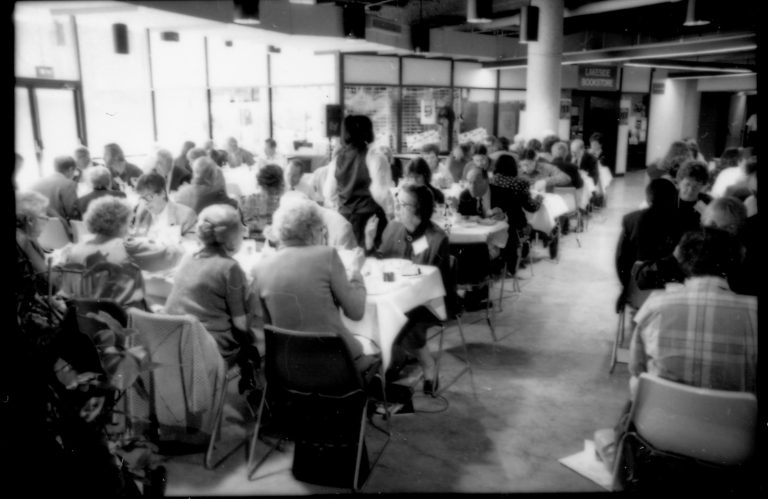 People seated at tables eating. 1992 Lincoln Colloquium Lincoln, Colloquium