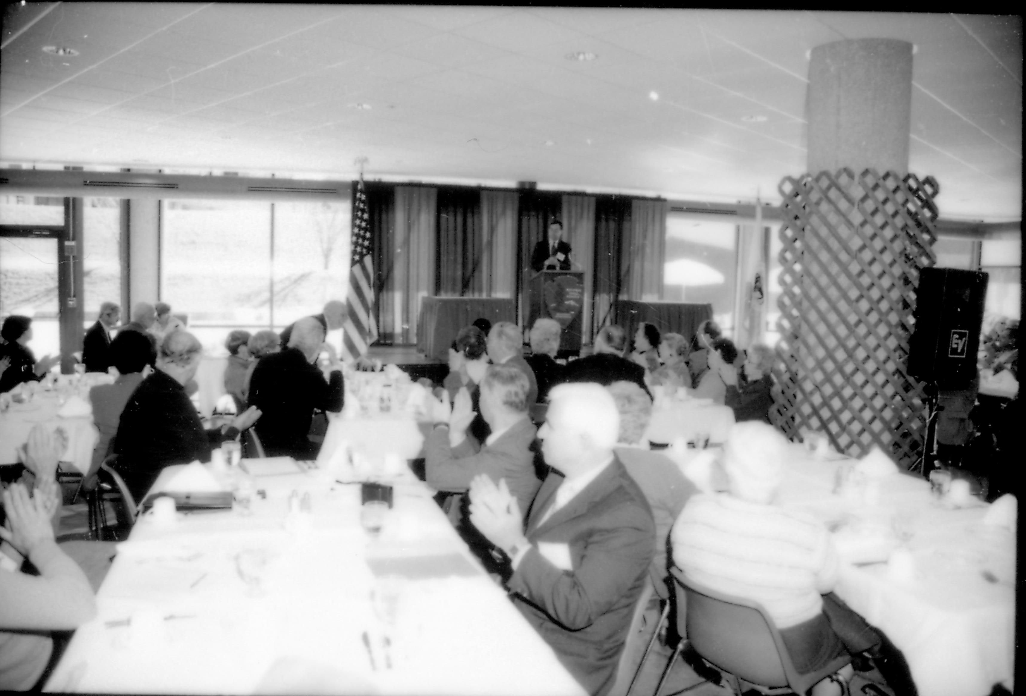 Dining area, people listening to speaker. 8th Annual Lincoln Colloquium; A Lincoln, Colloquium