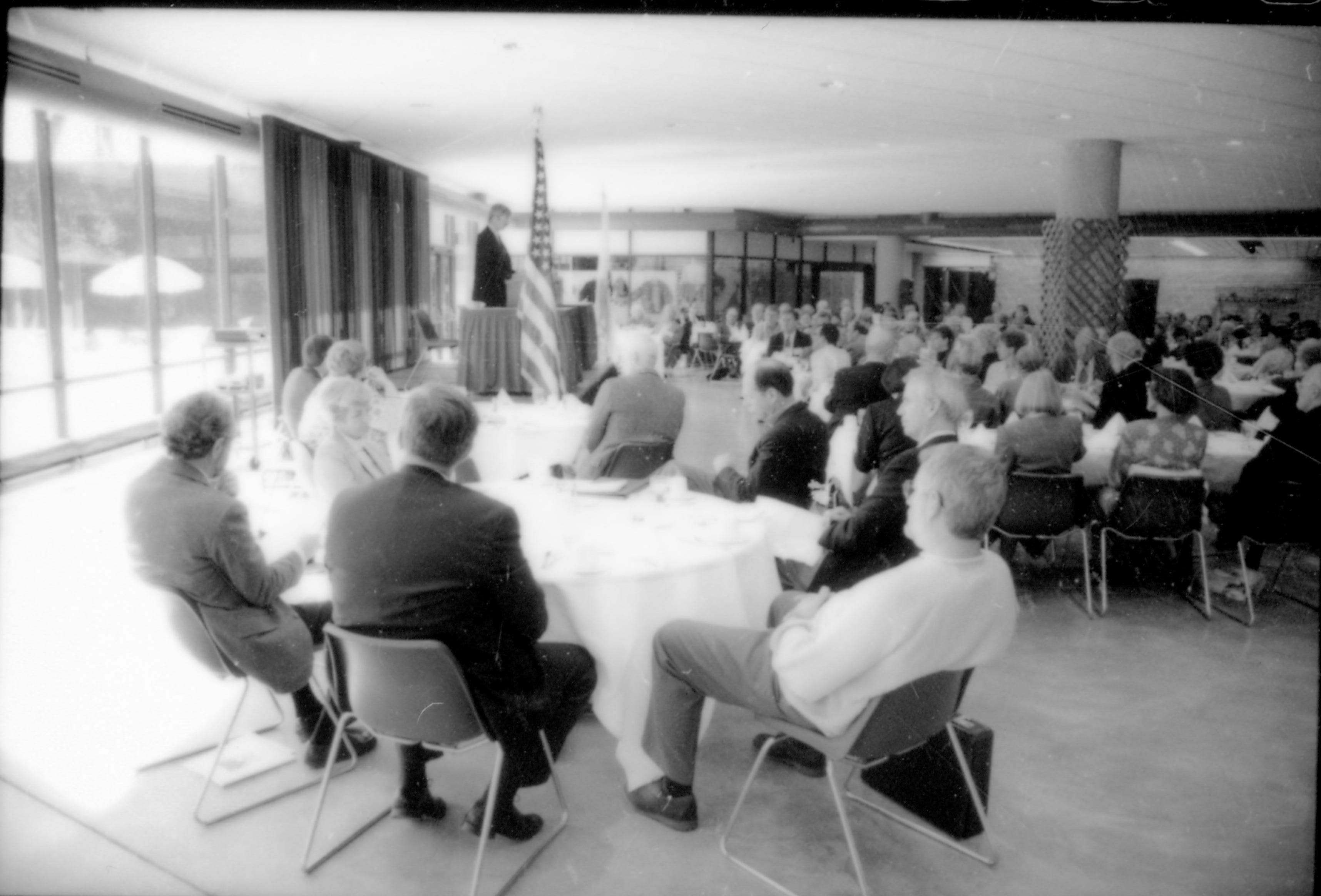 People in dining area listening to speaker. 8th Annual Lincoln Colloquium; A Lincoln, Colloquium