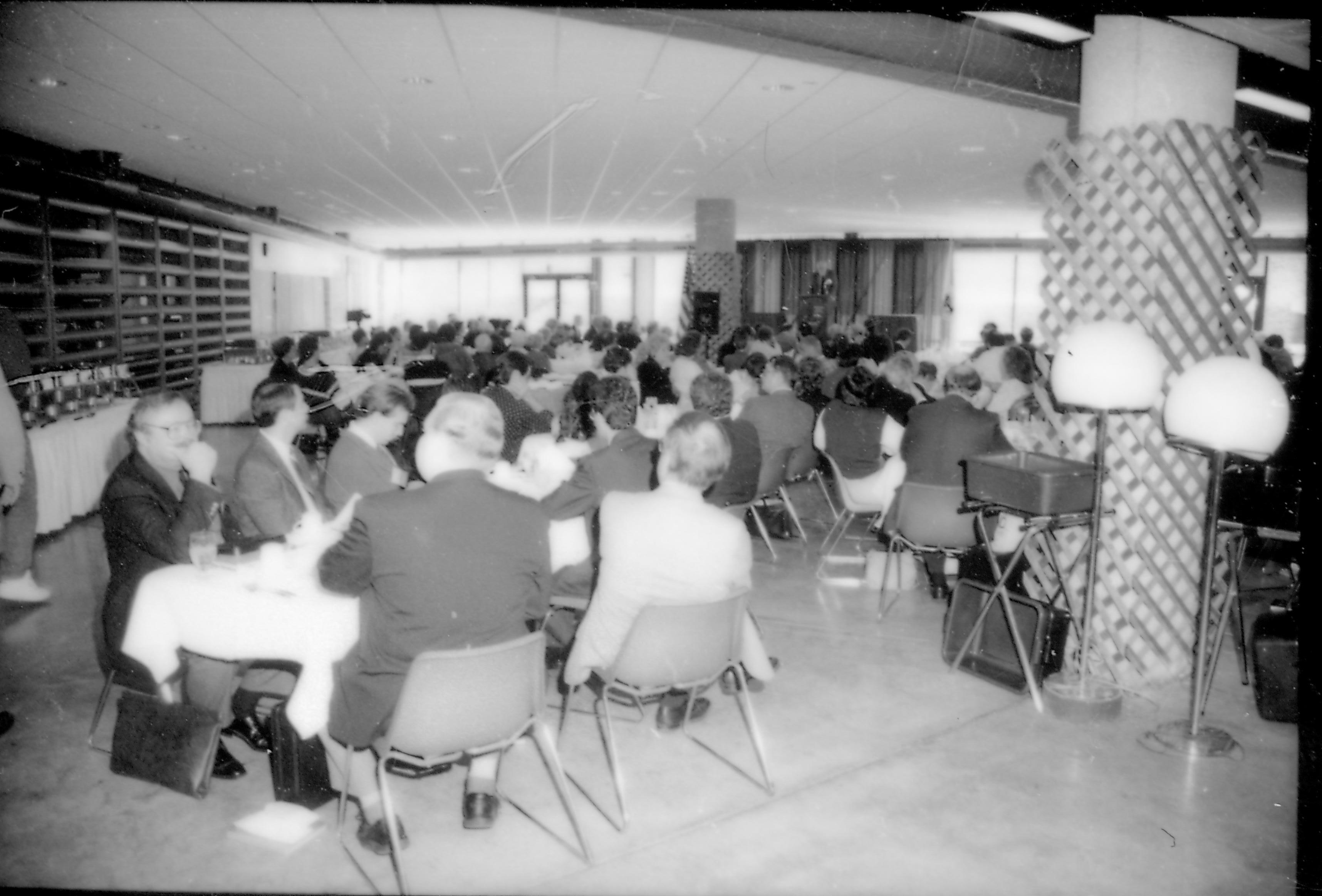 People in dining area listening to speaker. 8th Annual Lincoln Colloquium; A Lincoln, Colloquium