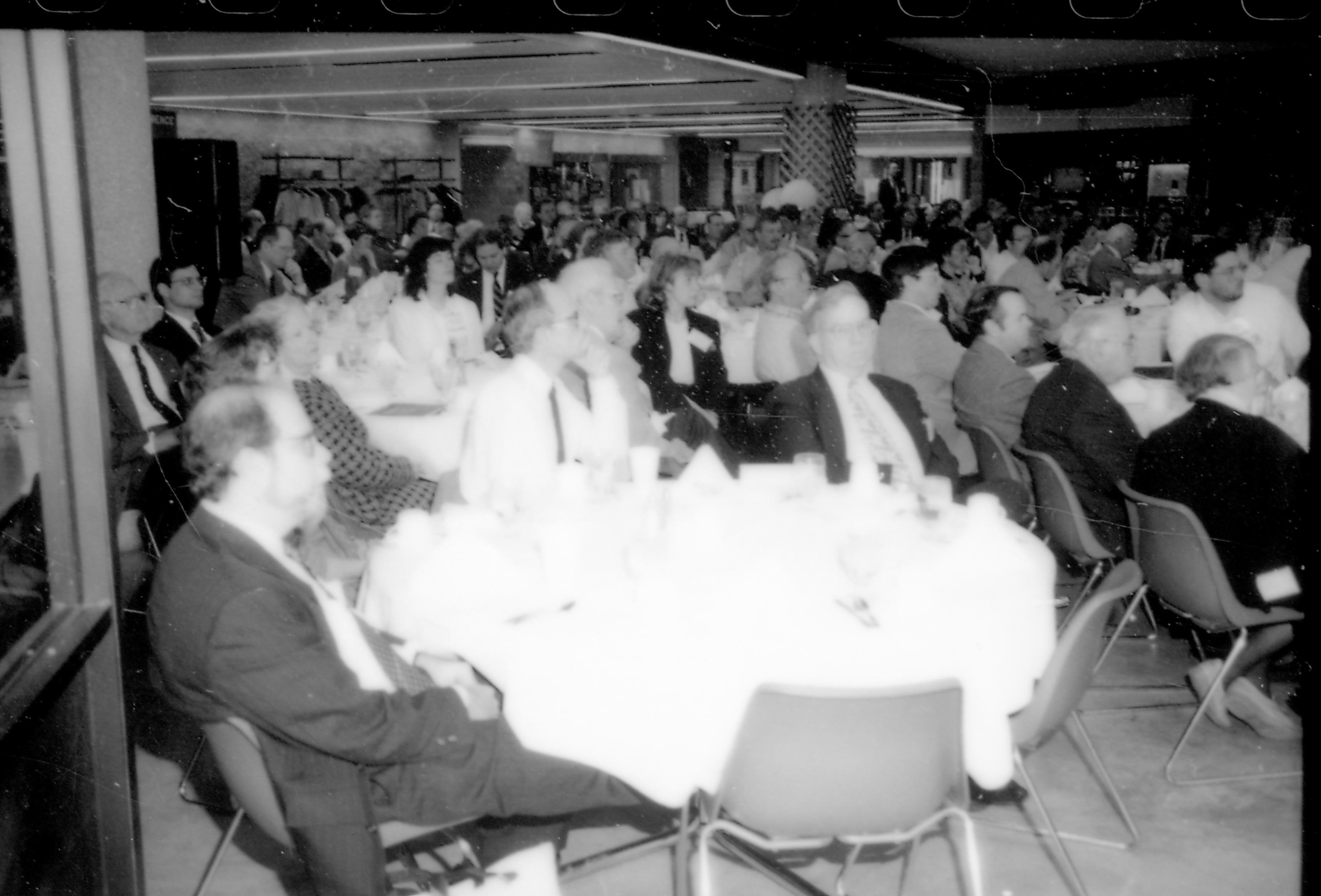 People in dining area listening to speaker. 8th Annual Lincoln Colloquium; A Lincoln, Colloquium