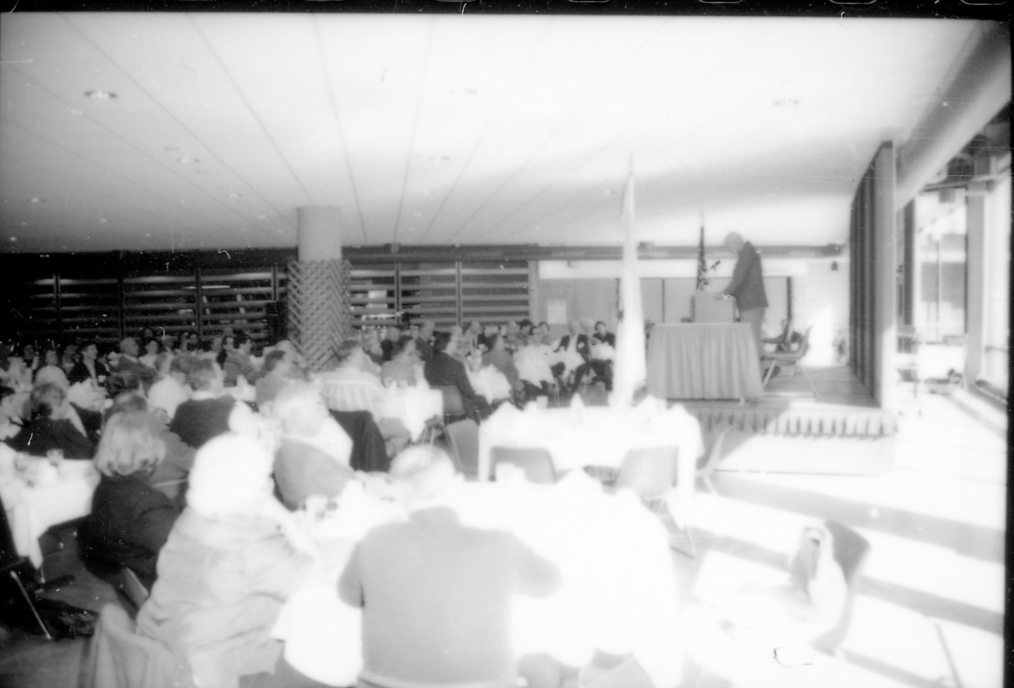 People in dining area listening to speaker. 8th Annual Lincoln Colloquium; A Lincoln, Colloquium