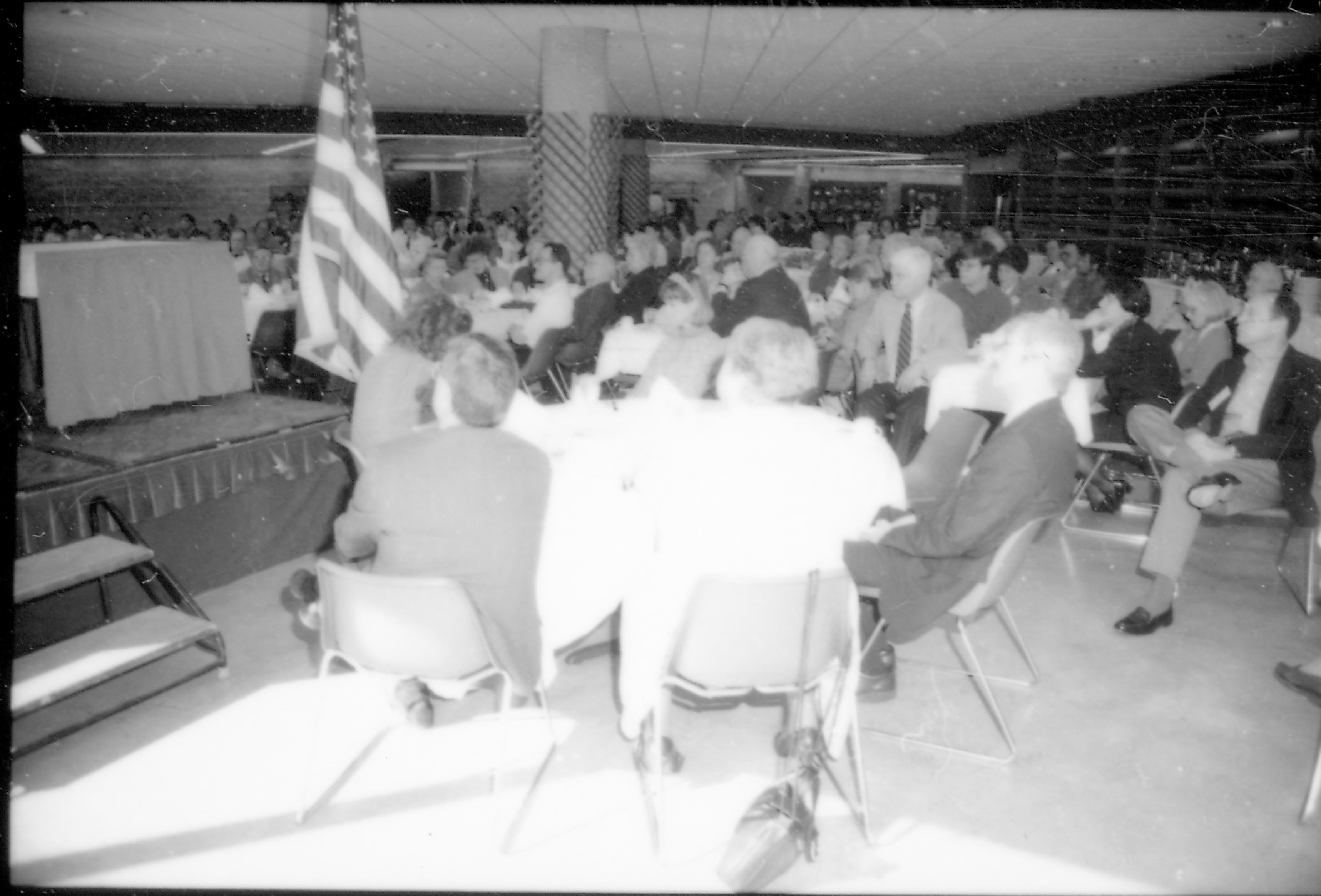 People in dining area listening to speaker. 8th Annual Lincoln Colloquium; A Lincoln, Colloquium