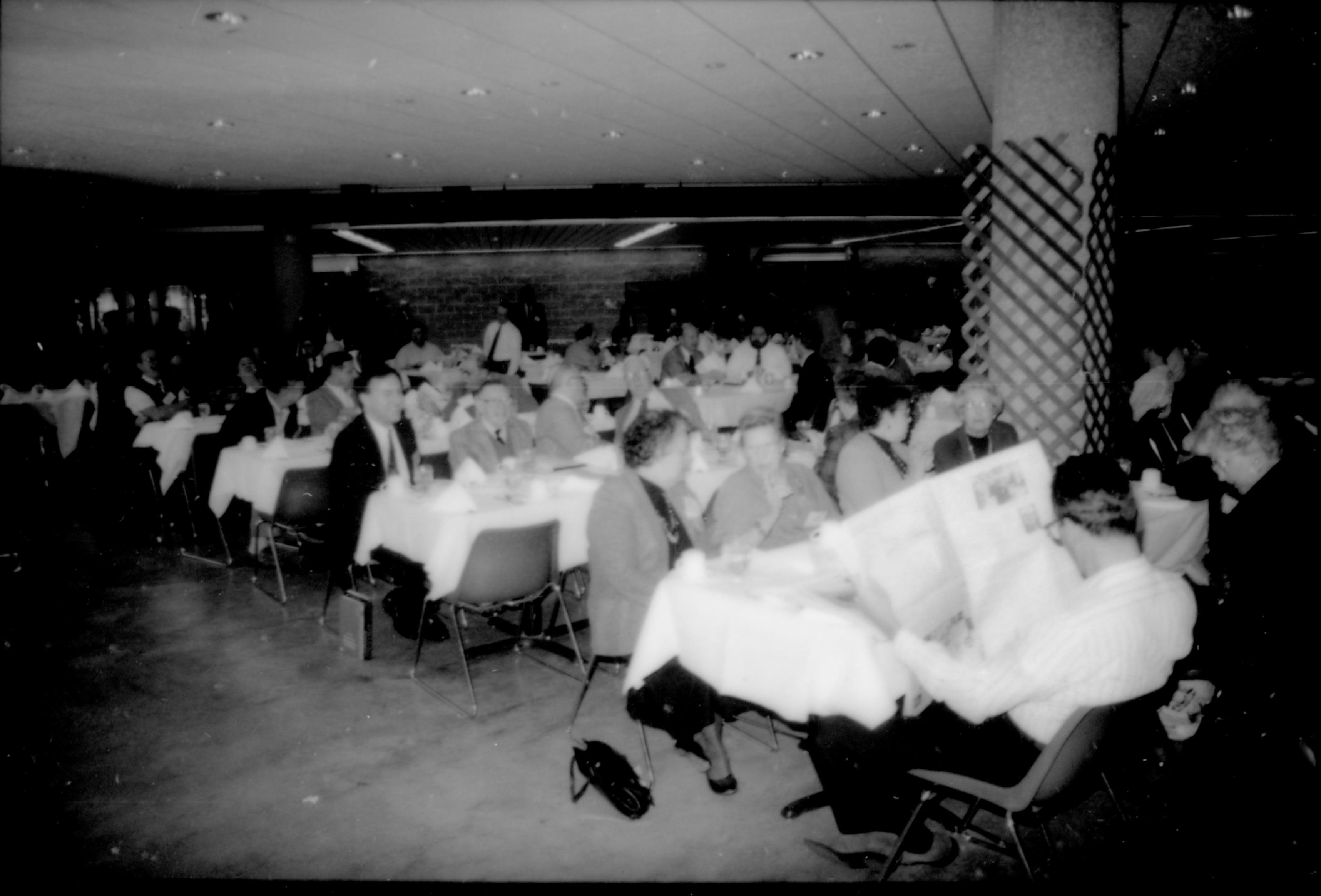 People seated at tables in dining room. 8th Annual Lincoln Colloquium; B Lincoln, Colloquium