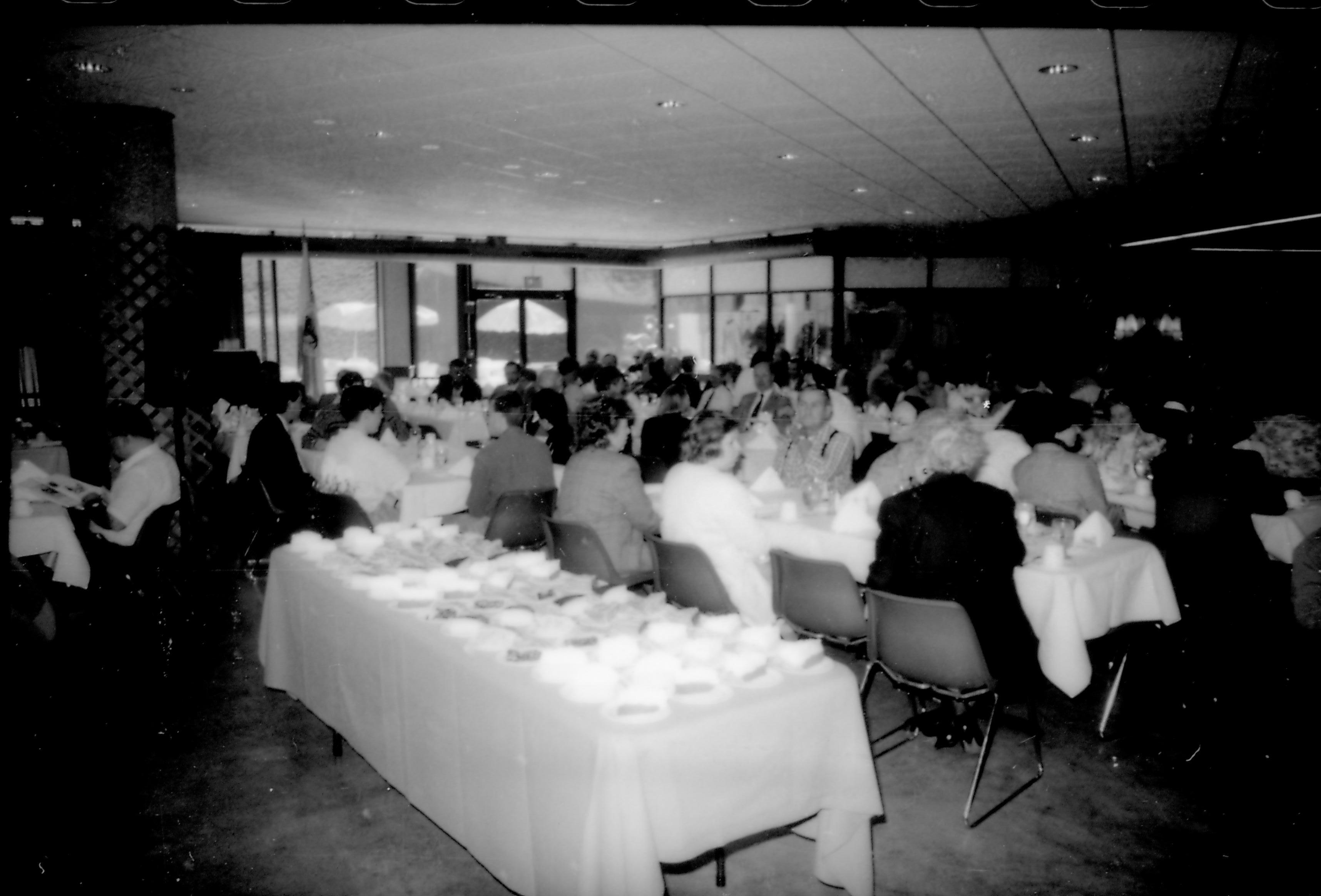 People seated at tables in dining room. 8th Annual Lincoln Colloquium; B Lincoln, Colloquium