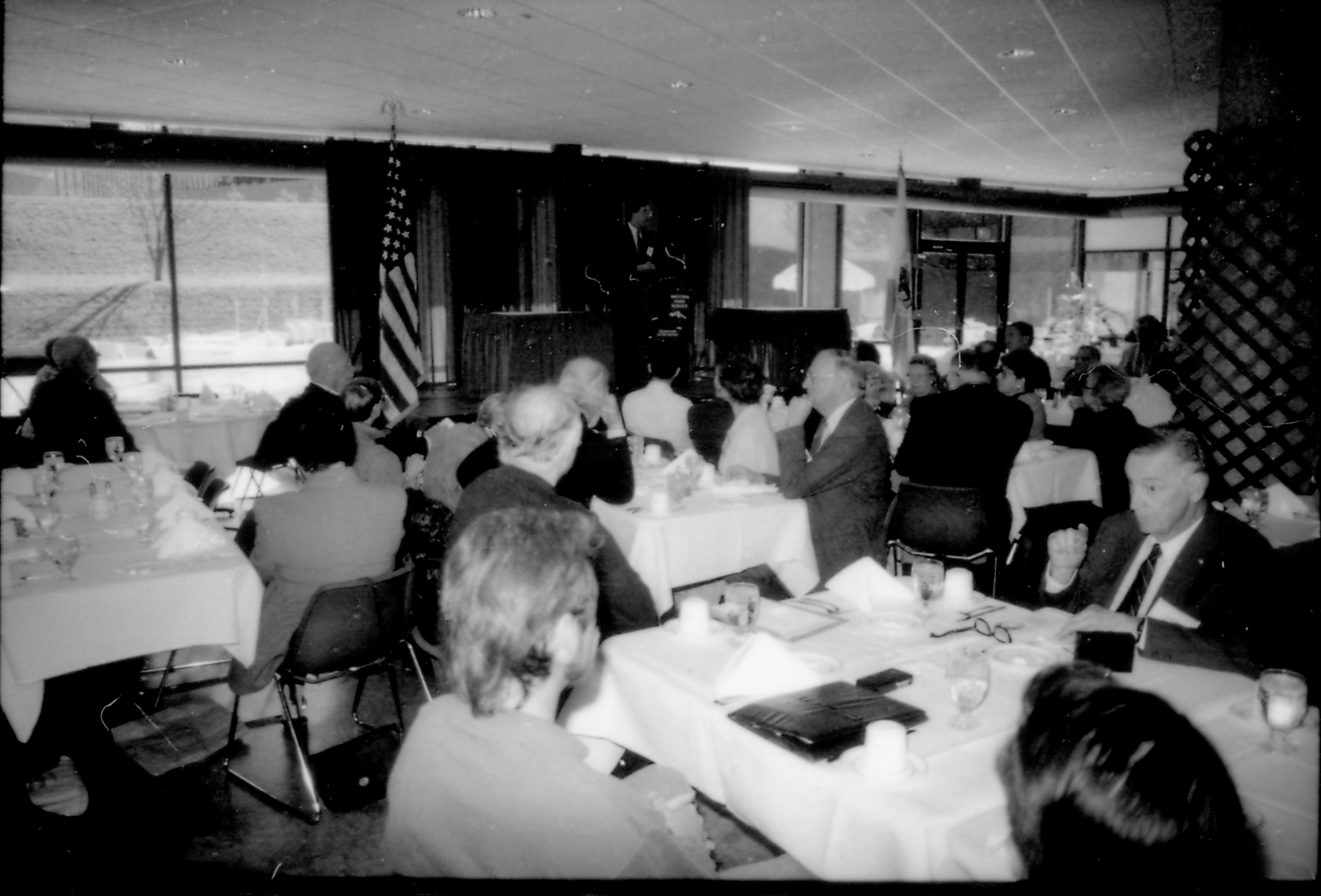 People in dining area listening to speaker. 8th Annual Lincoln Colloquium; B Lincoln, Colloquium