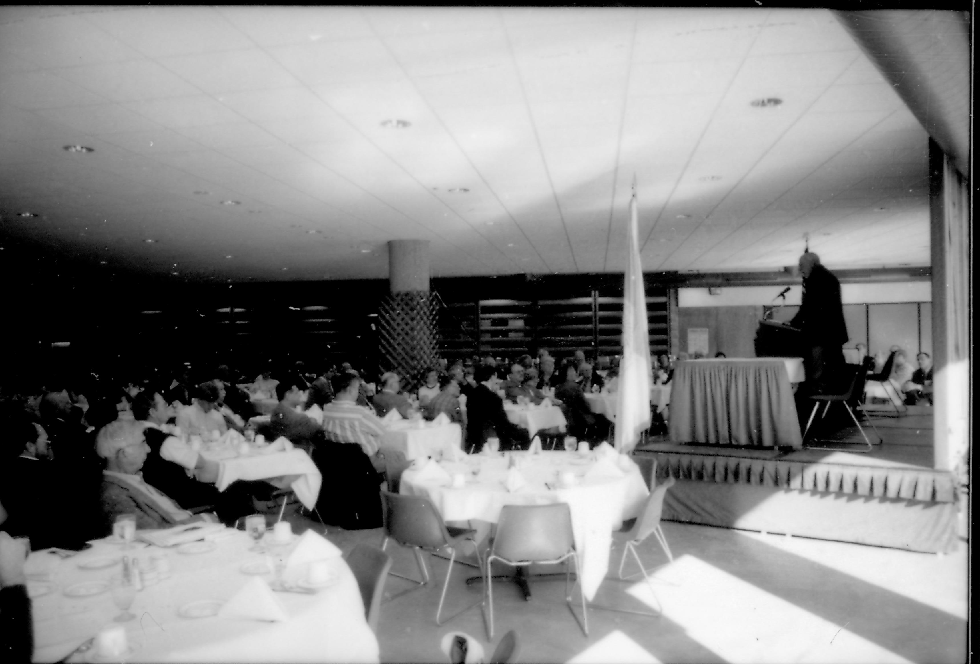 People in dining area listening to speaker. 8th Annual Lincoln Colloquium; B Lincoln, Colloquium