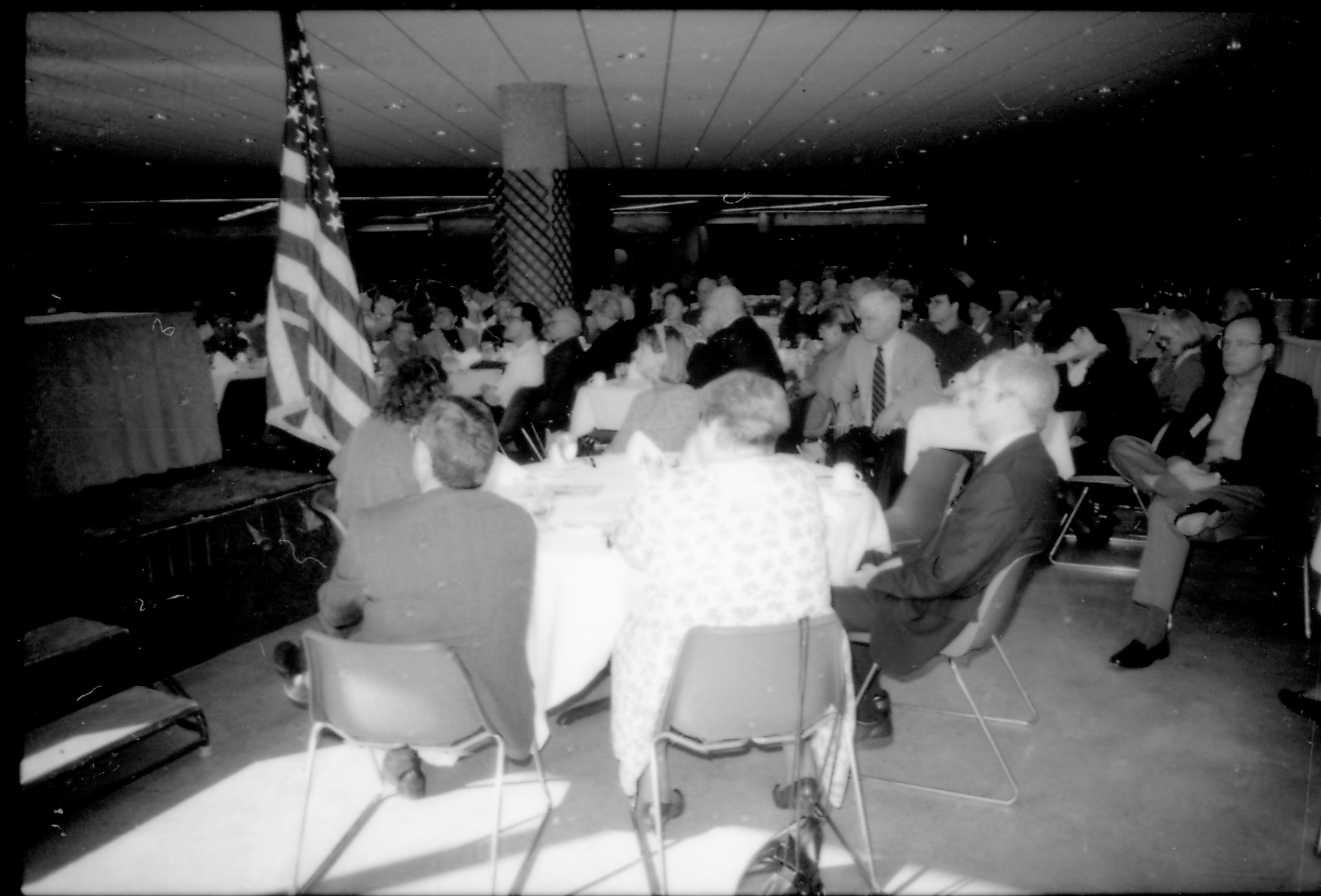 People in dining area listening to speaker. 8th Annual Lincoln Colloquium; B Lincoln, Colloquium