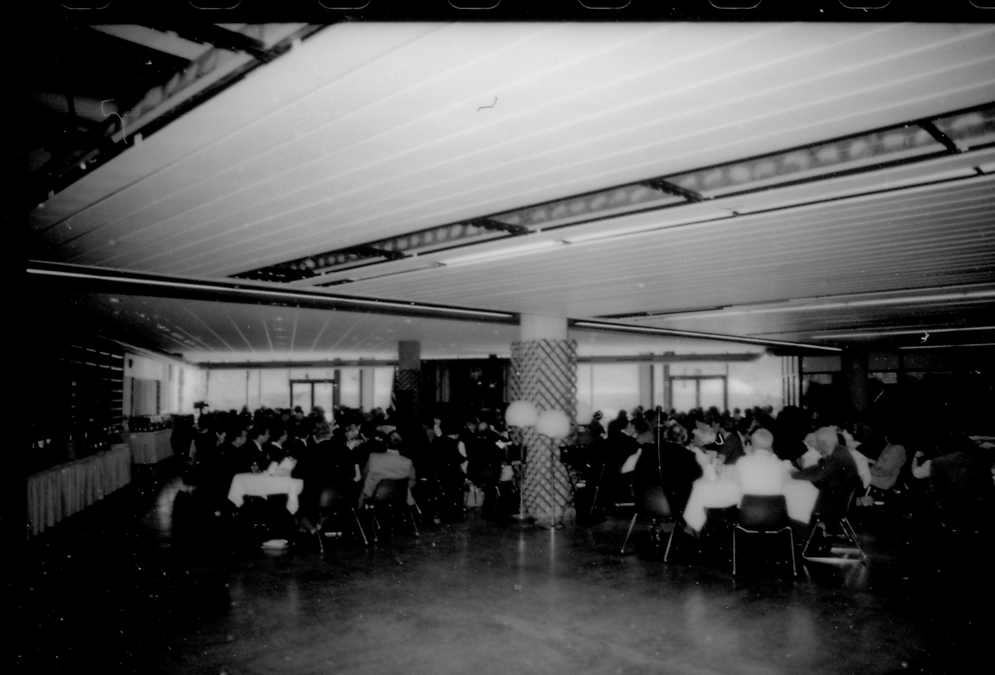 Distant view of people dining. 8th Annual Lincoln Colloquium; B Lincoln, Colloquium