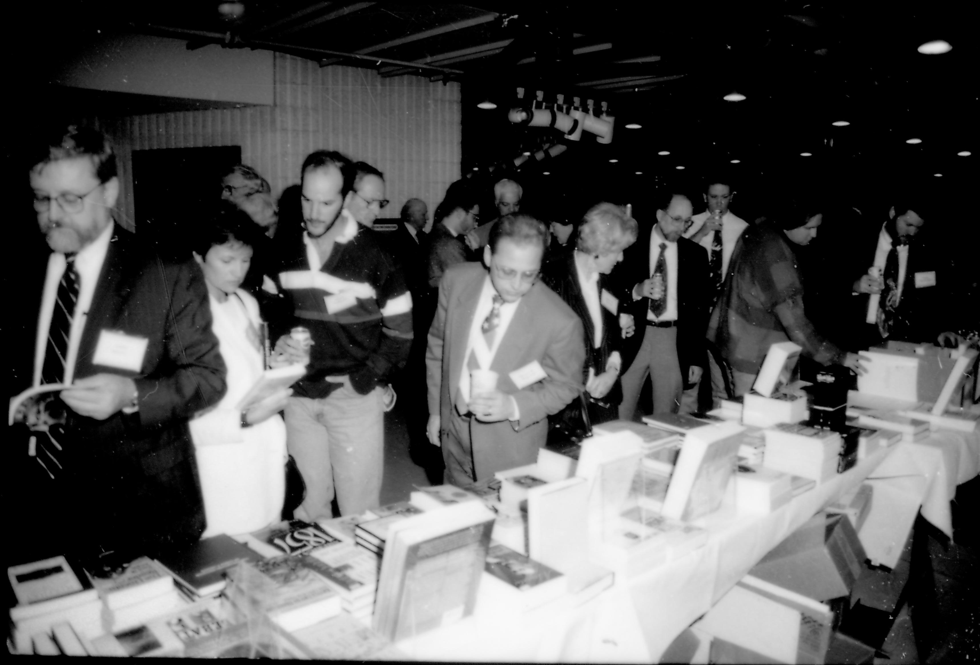 Lots of people at book tables. 8th Annual Lincoln Colloquium; E Lincoln, Colloquium