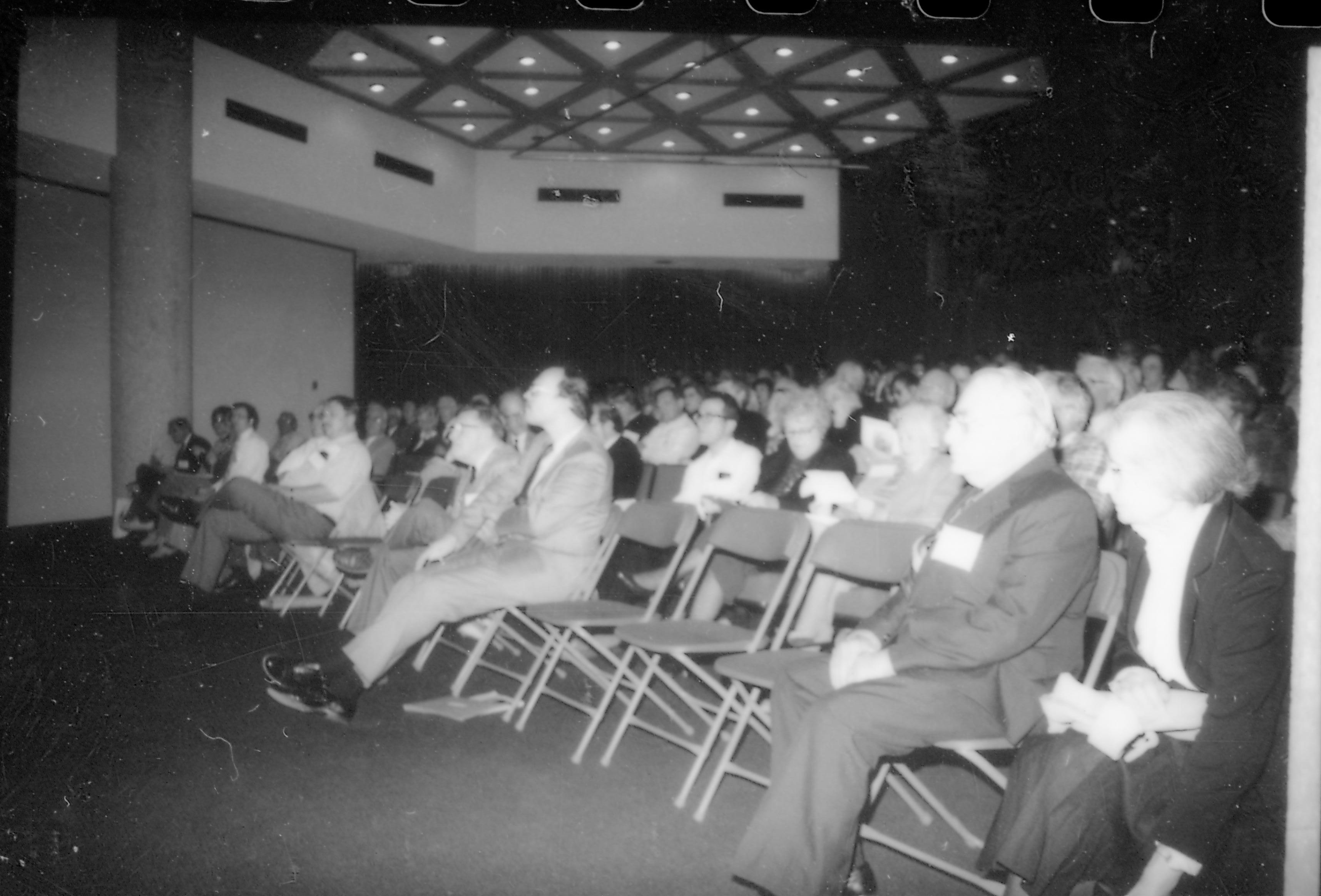 People, seated in lecture room, listening to speaker. 8th Annual Lincoln Colloquium; C Lincoln, Colloquium