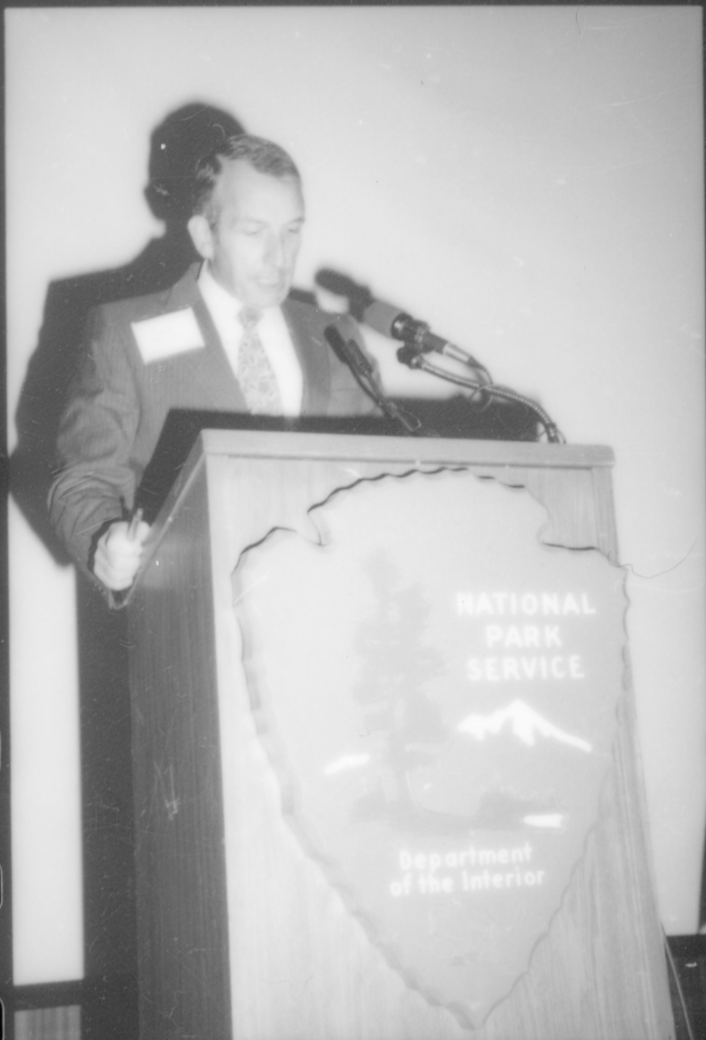 Close up of man speaking at podium. 8th Annual Lincoln Colloquium; D Lincoln, Colloquium