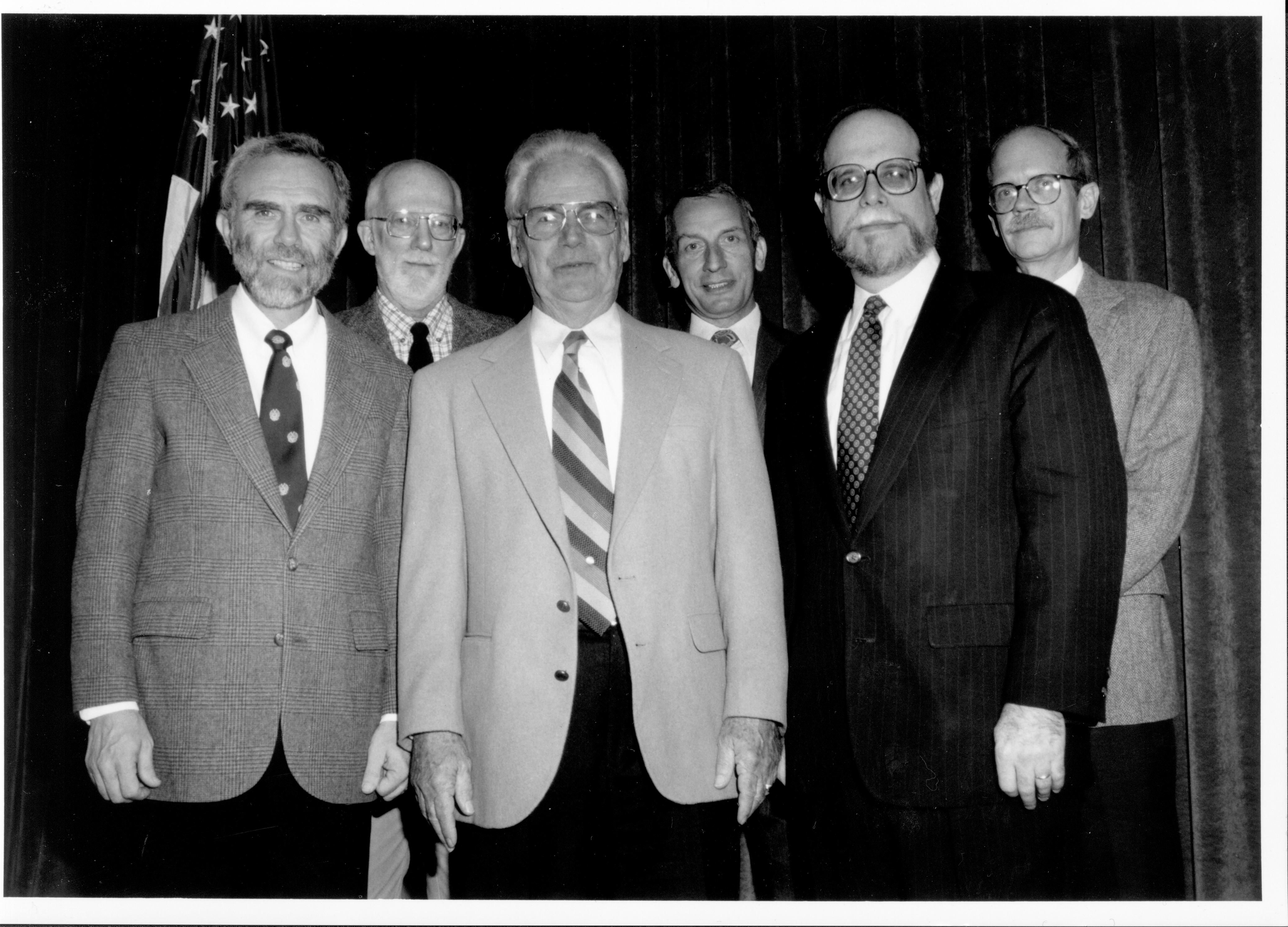 Six men standing for picture. 8th Annual Lincoln Colloquium; D Lincoln, Colloquium