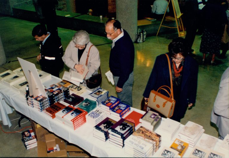 Looking down at book table and attendees. Lincoln Colloquium; 56917 Lincoln, Colloquium