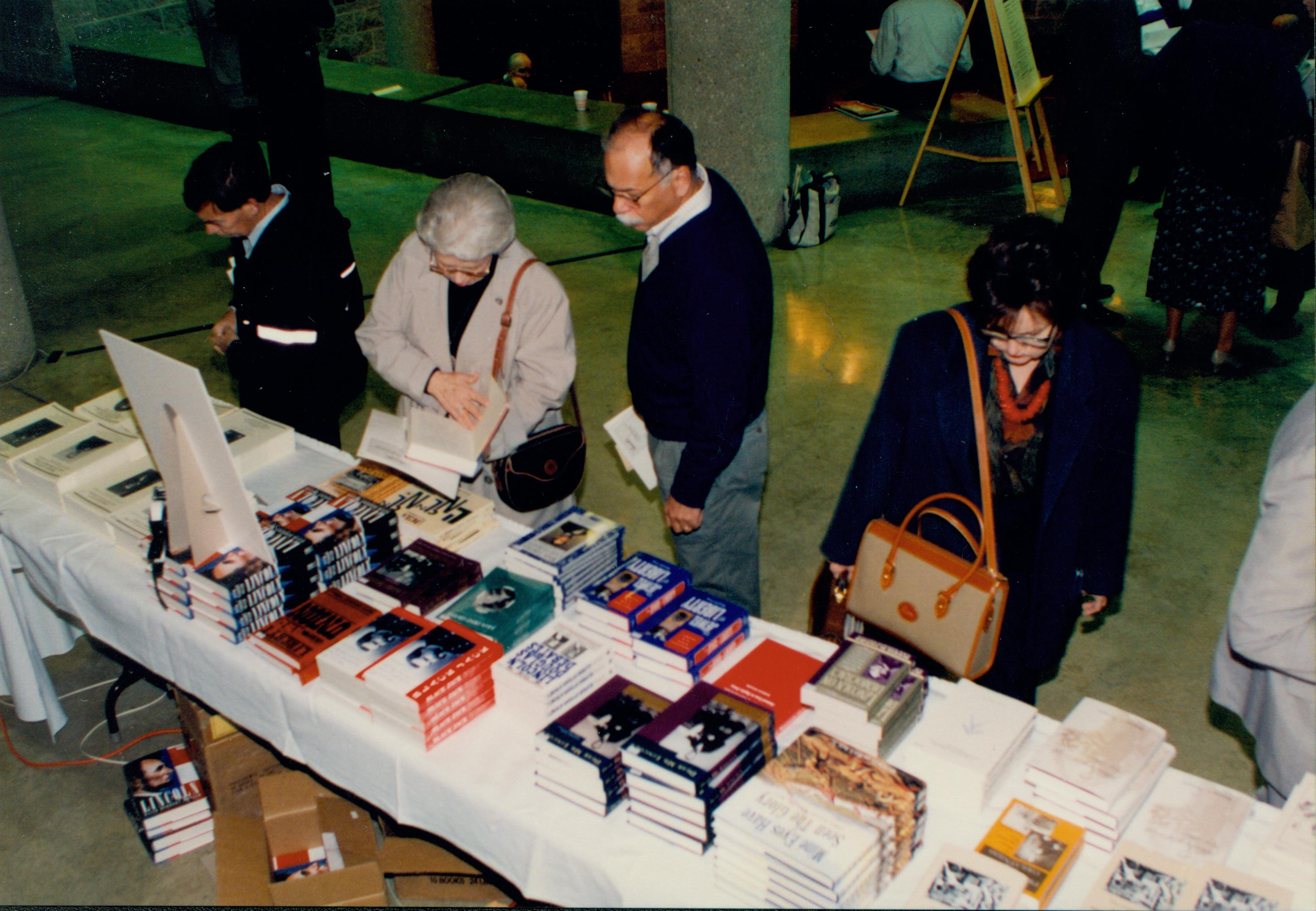 Looking down at book table and attendees. Lincoln Colloquium; 56917 Lincoln, Colloquium