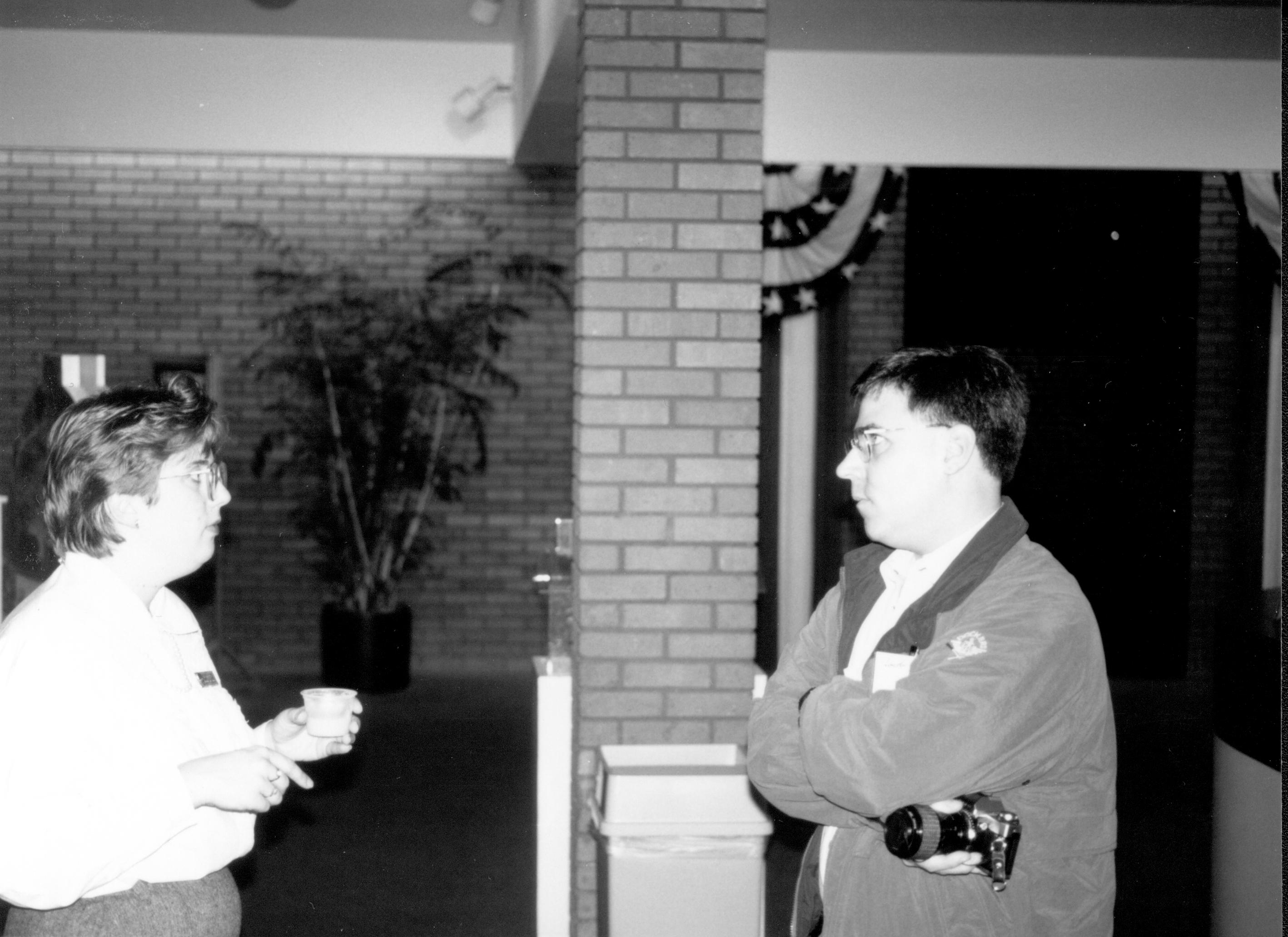 Man and woman talking. Lincoln Colloquium; UIS Roll#1, 3of4 Lincoln, Colloquium