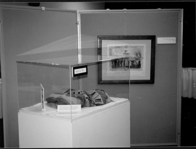 Artifact in display case. Lincoln Colloquium; UIS Roll#1, 3of4 Lincoln, Colloquium