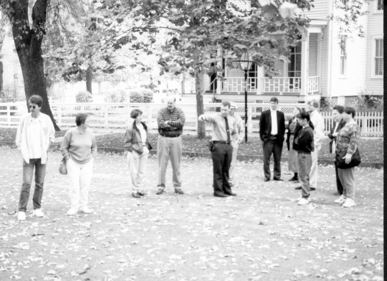 Visitors standing in street with Ranger. Lincoln Colloquium; UIS Roll#1, 1of4 Lincoln, Colloquium