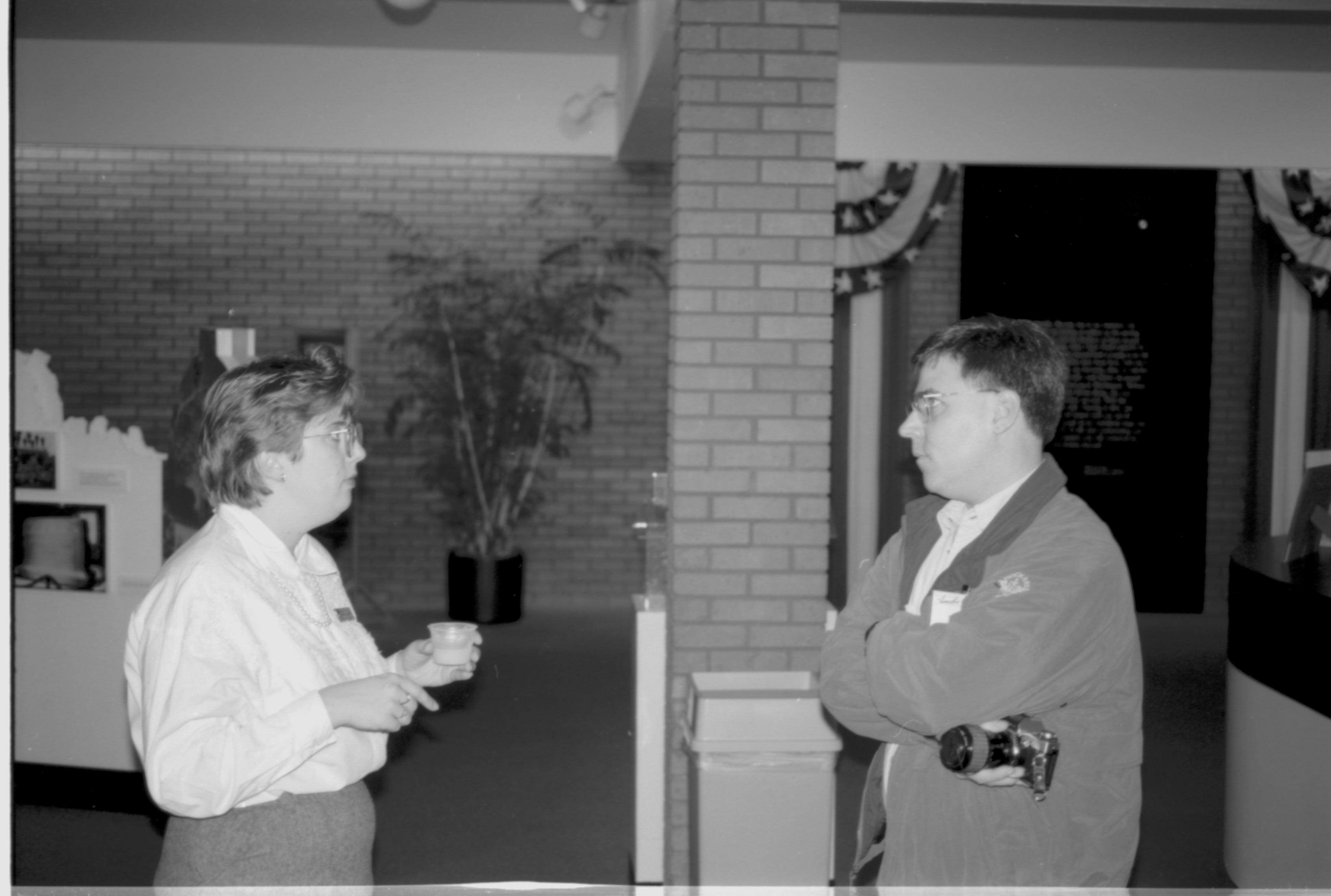 Lady and man talking in VC. Lincoln Colloquium; UIS Roll#1, 4of4 Lincoln, Colloquium