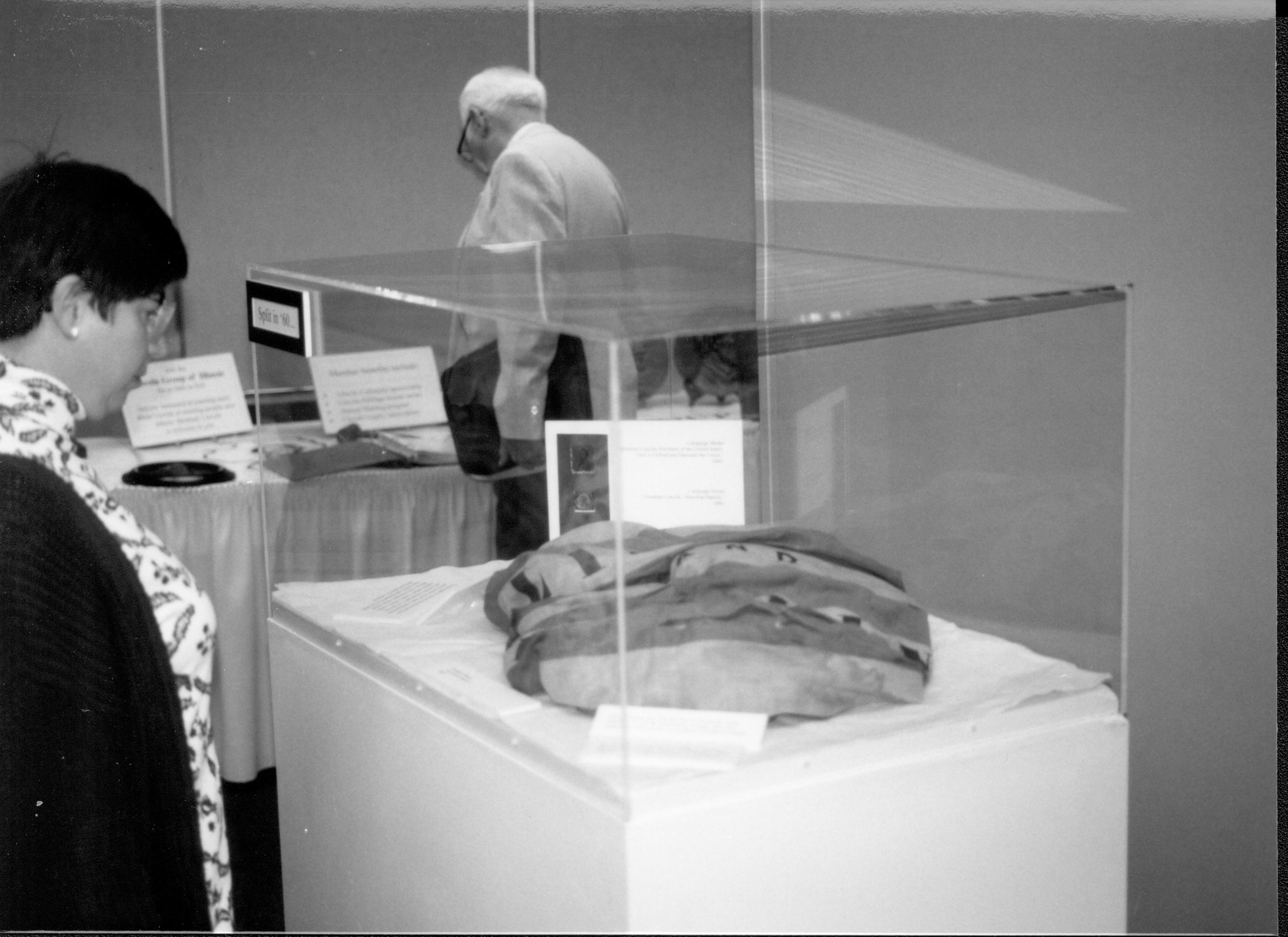 Lady looking at exhibit. Lincoln Colloquium; UIS Roll#2, 2of4 Lincoln, Colloquium