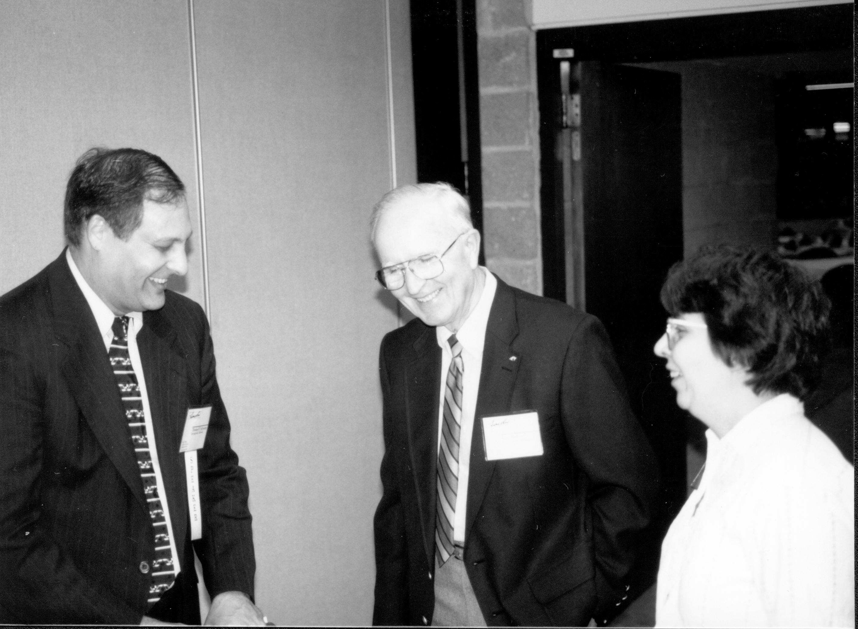 Two men and a lady talking. Lincoln Colloquium; UIS Roll#2, 3of4 Lincoln, Colloquium